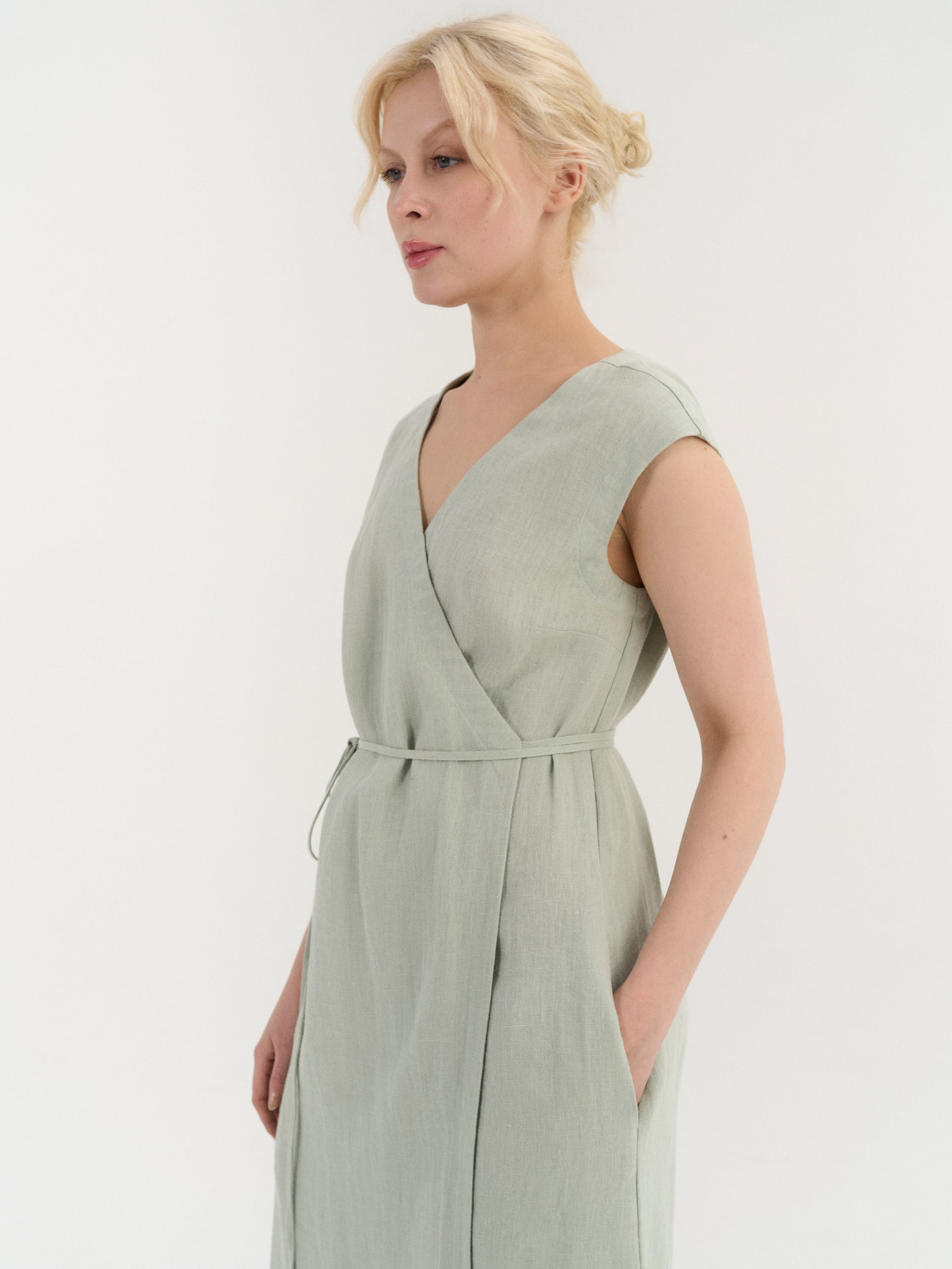 light green wrap dress Aurora peacock pattern