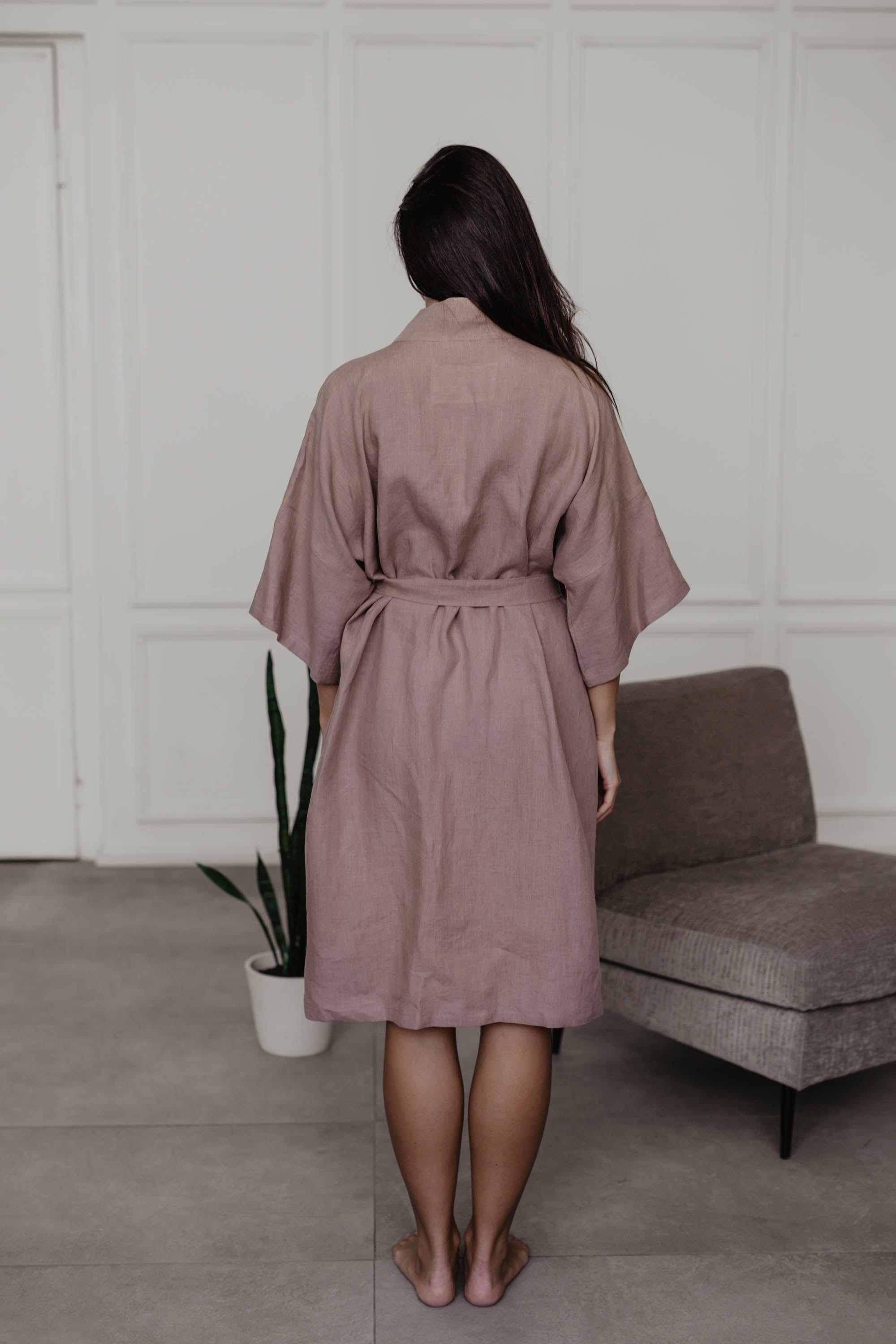 Woman Facing Back Wearing A Dusty Rose LInen Bathrobe