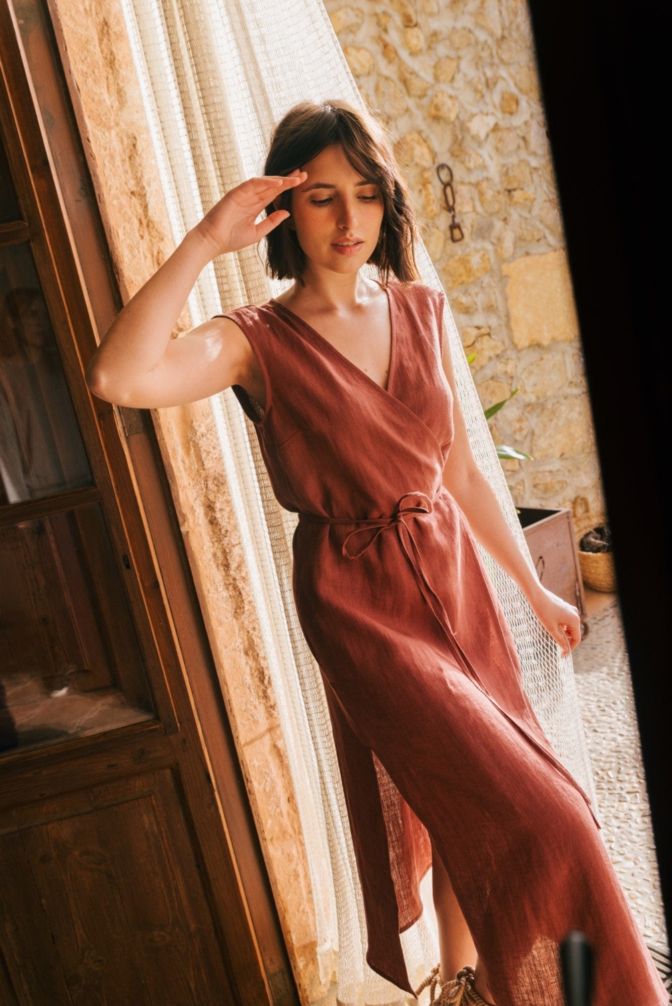 Aurora mid length linen dress in Terracotta