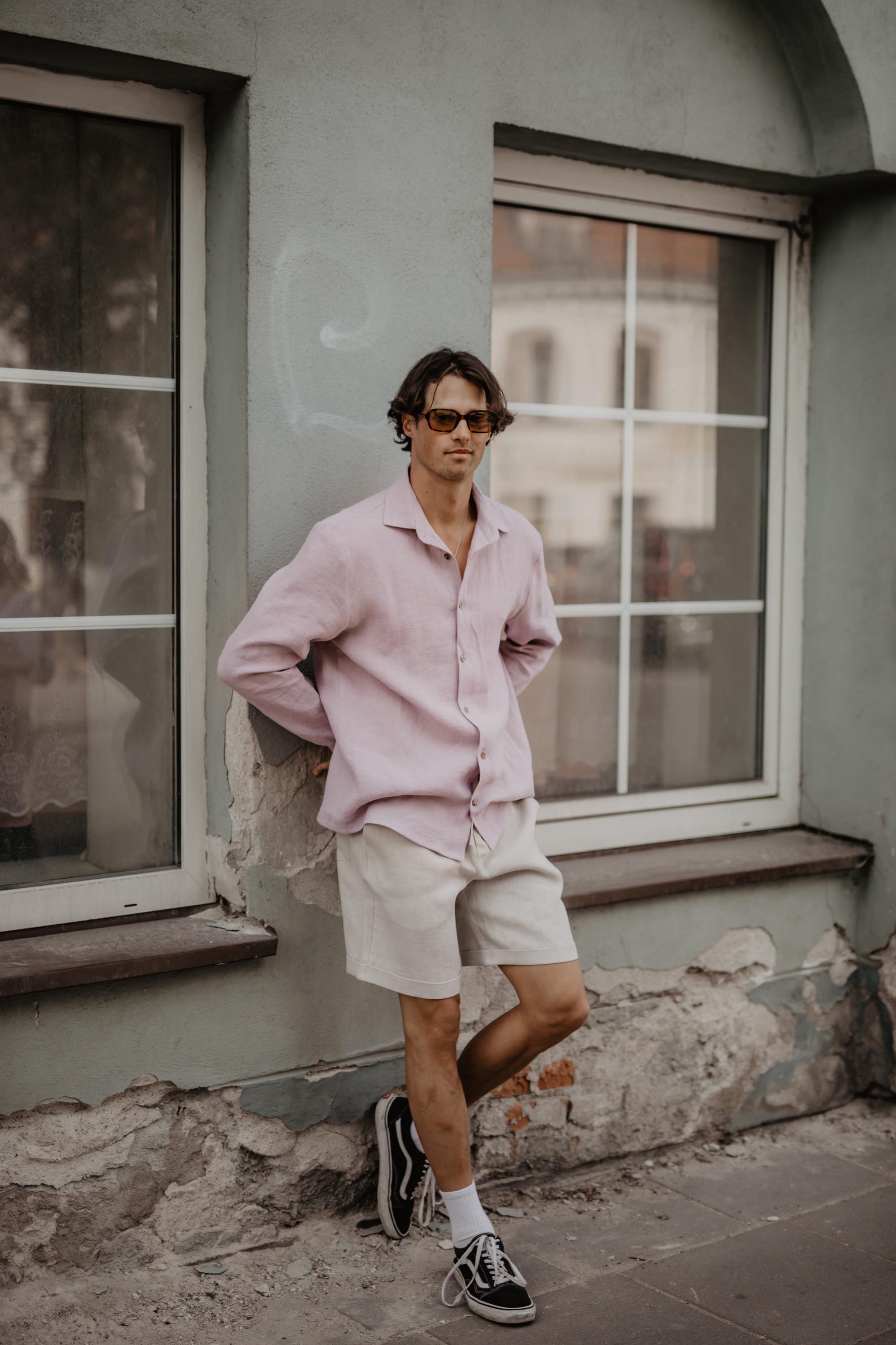 Man Wearing Cotton Candy Color Classic Linen Shirt Leaning On A Wall
