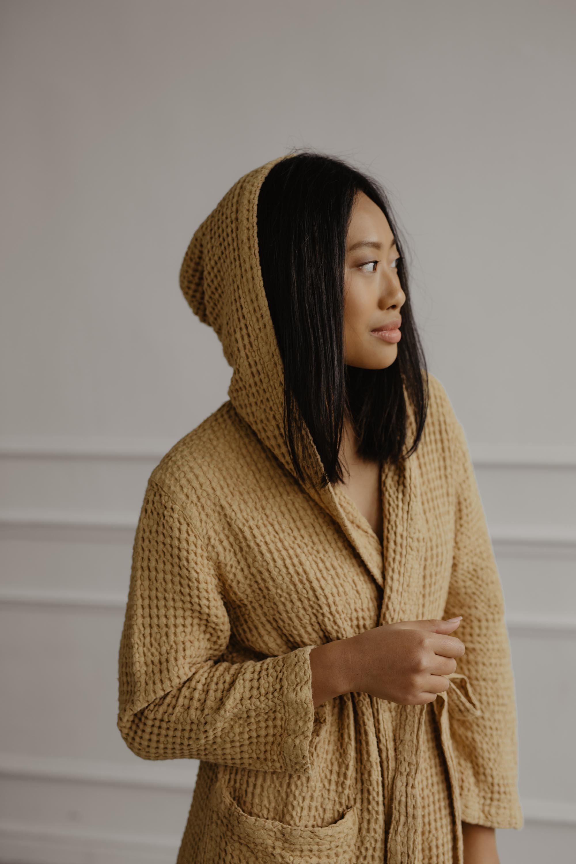 Close up Of Woman Wearing A Mustard Color Linen Waffle Bathrobe
