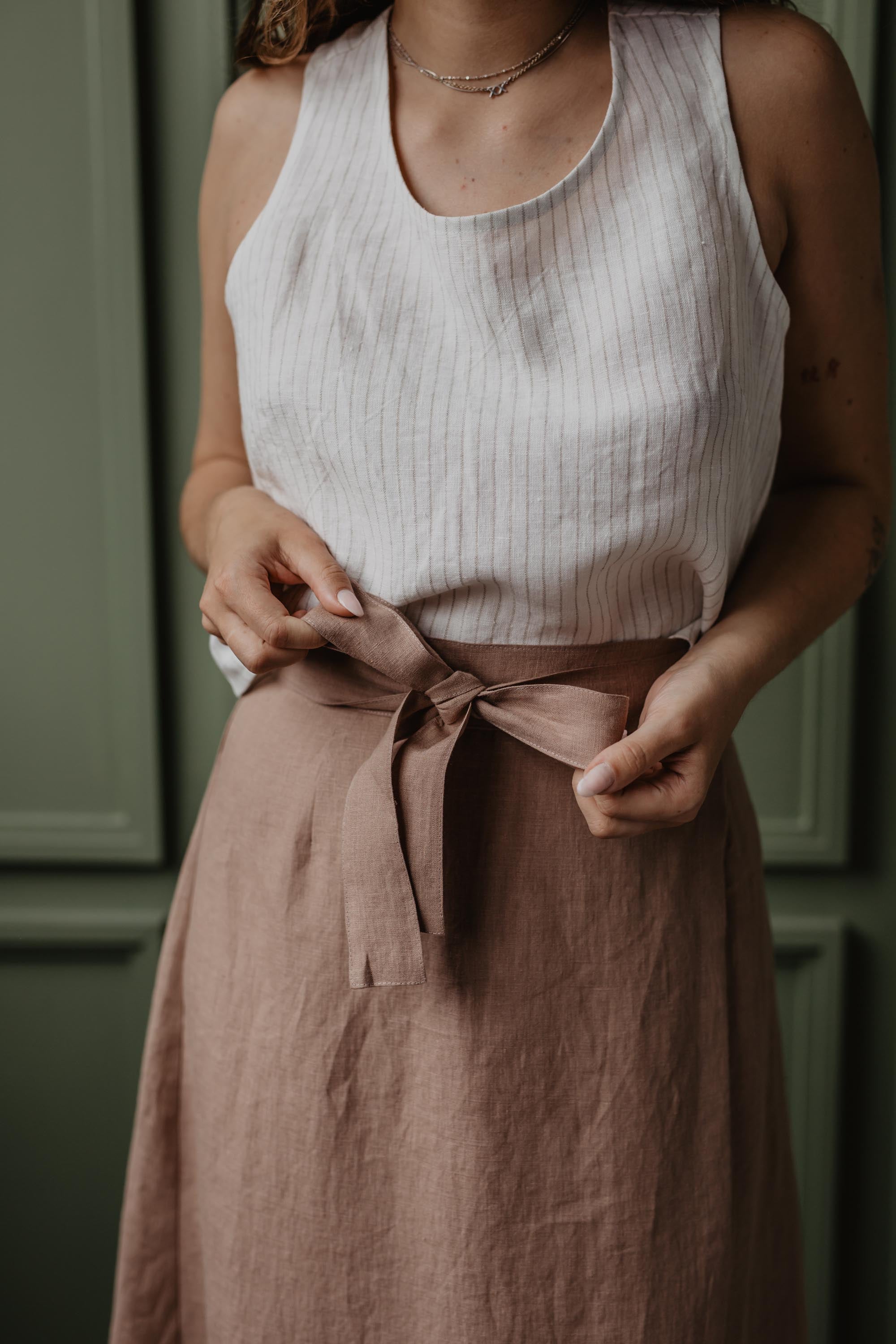 Close Up Of Dusty Rose Linen Skirt Ribbon