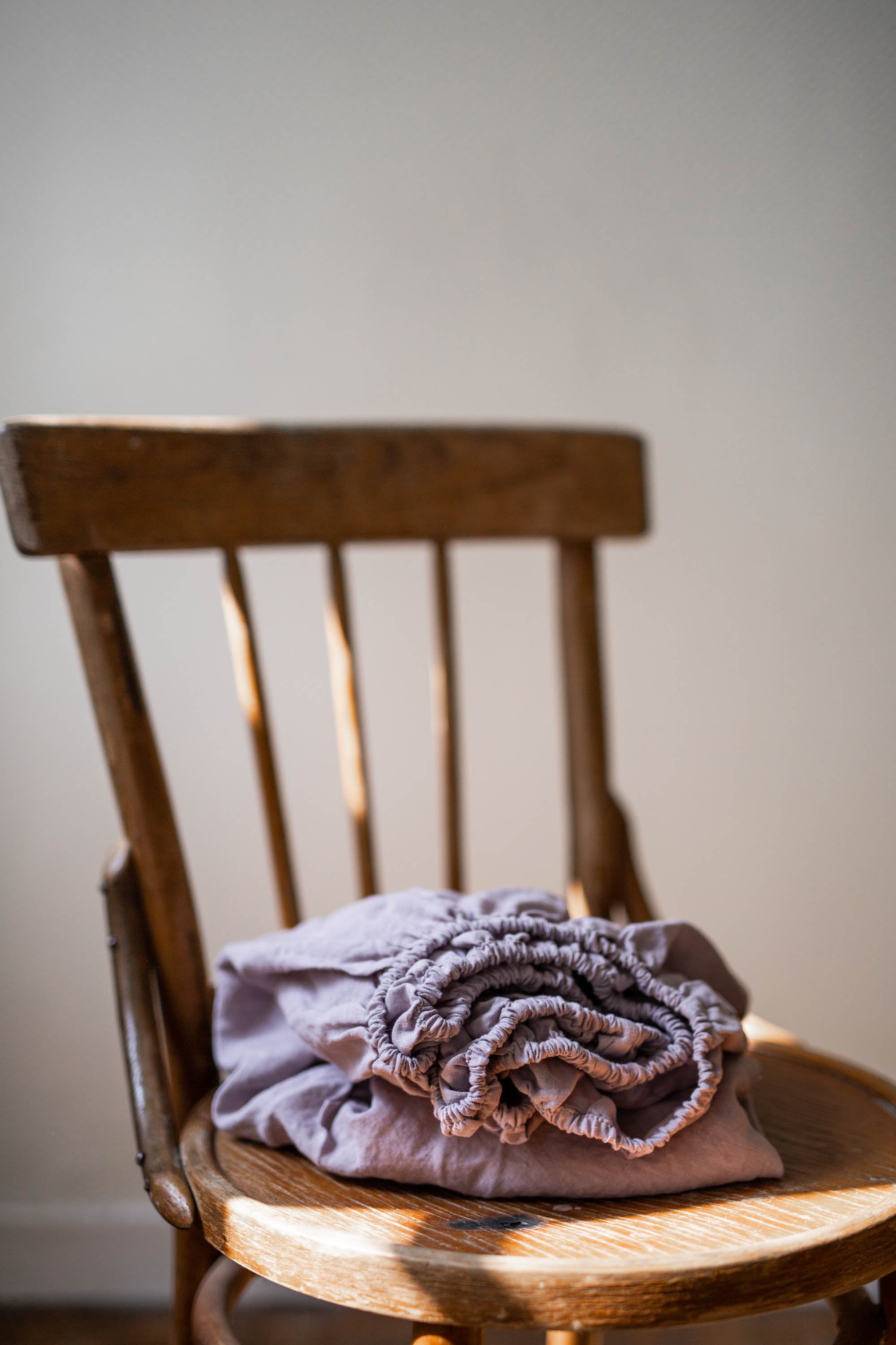 Dusty Lavender Linen Crib Sheet on Chair By Amourlinen