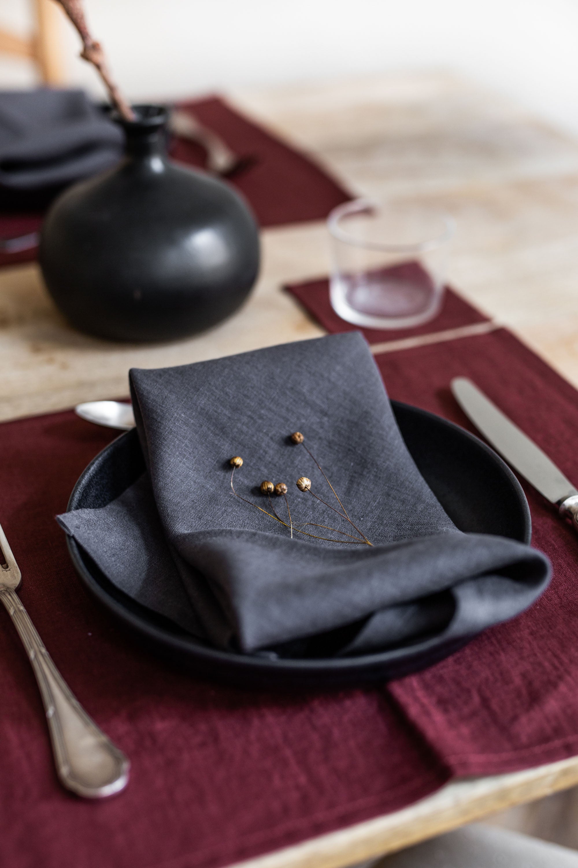 Set Dinner Table With A Focus on Charcoal Linen Napkins By AmourlInen