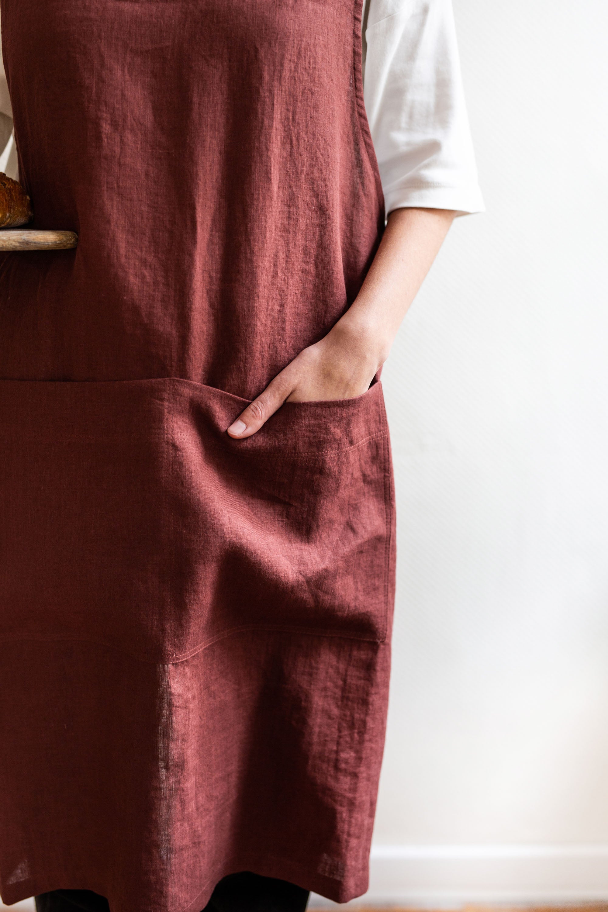 Close Up Of Pinafore Linen Apron In Terracotta By AmourlInen