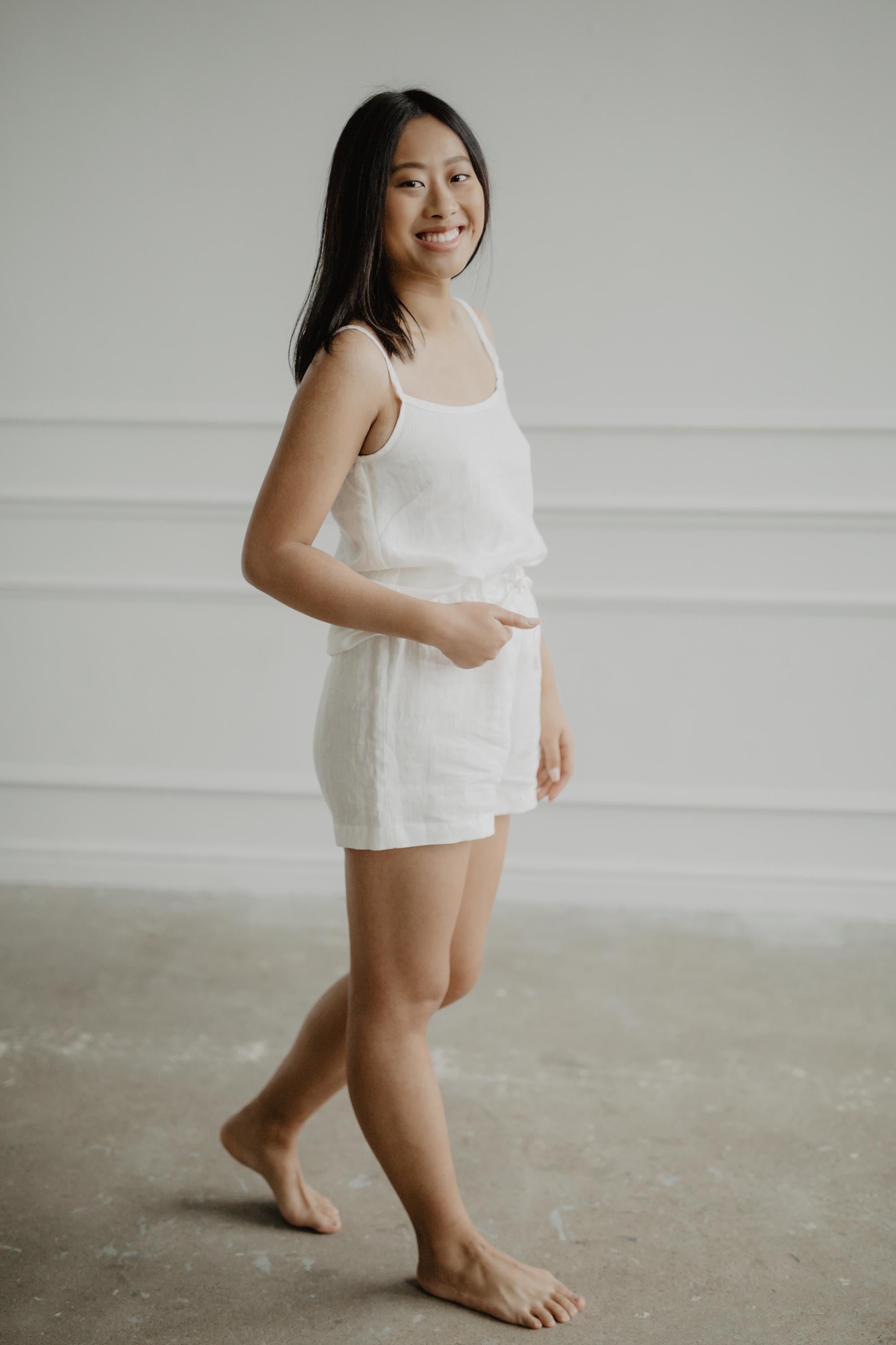 Woman Wearing A Sleeveless Linen Pajama Set by AmourLinen