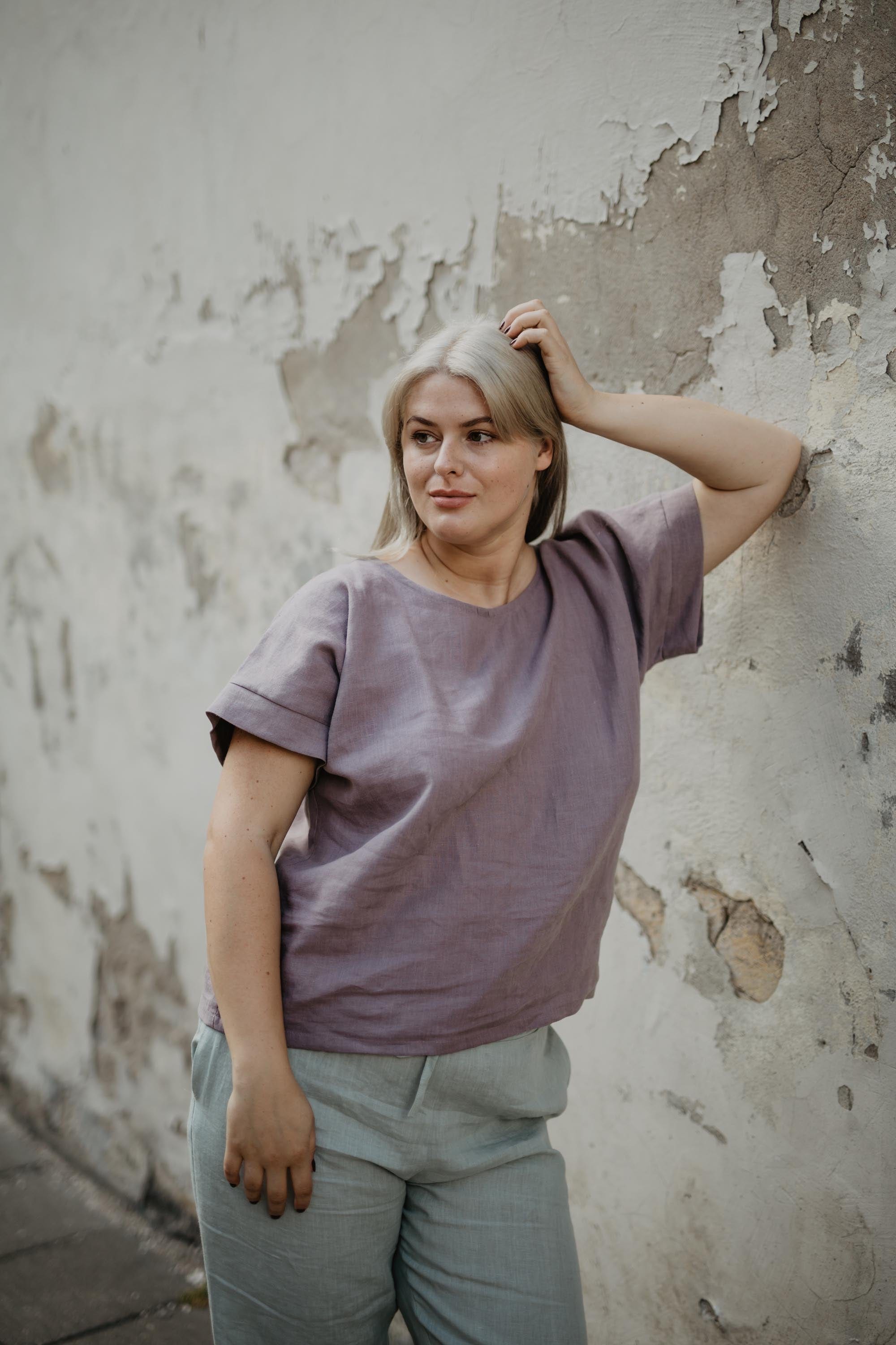 Woman Wearing Dusty Lavander Linen Top and Sage Green pants By Amourlinen