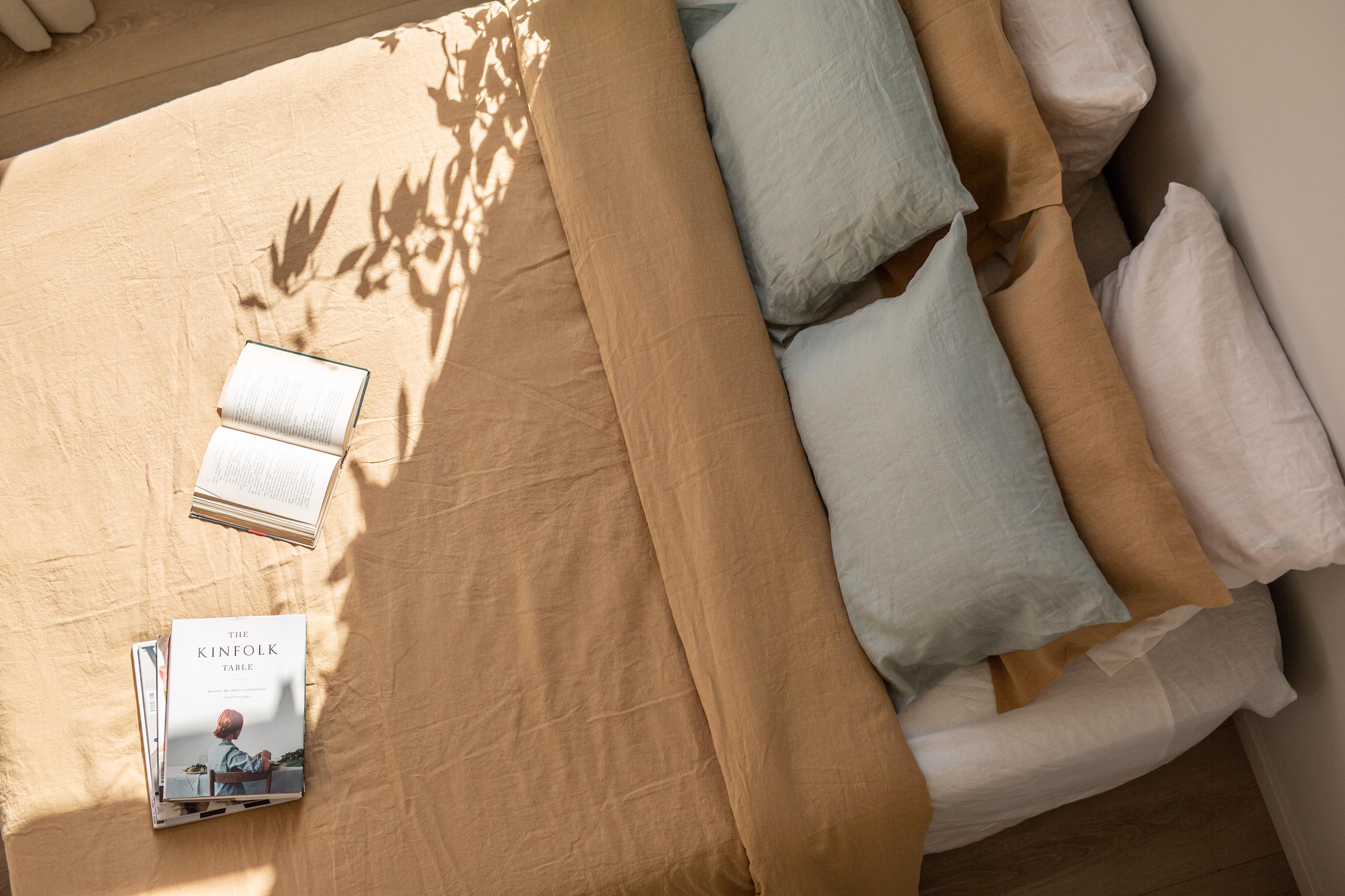 Top View of Tidy Bed With A Linen Duvet Cover In Mustard By AmourlInen