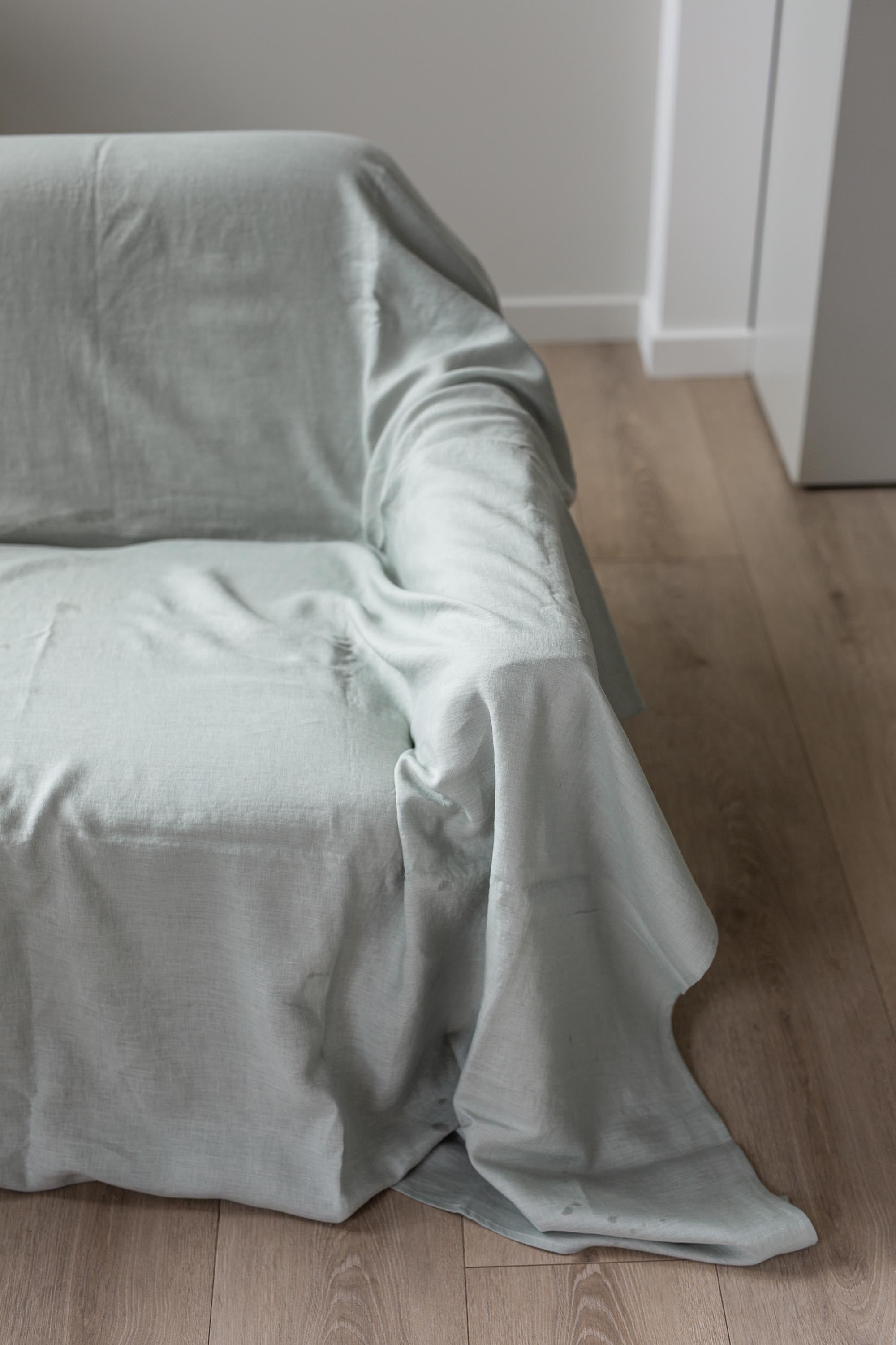 Close Up Of A Couch Covered Sage Green Linen Couch Cover By Amourlinen