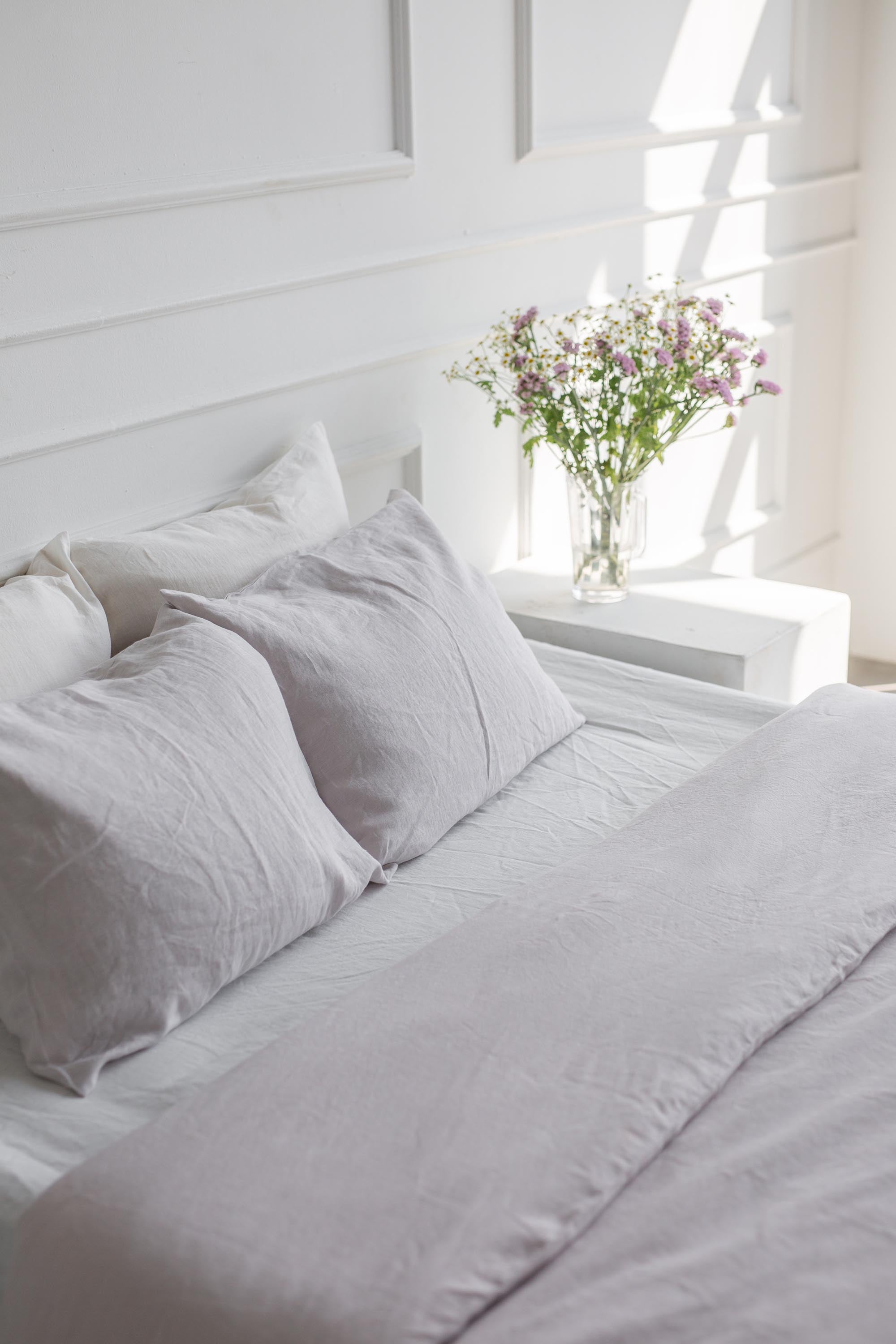 Cream LInen Pillowcase On Tidy Bed By AmourlInen