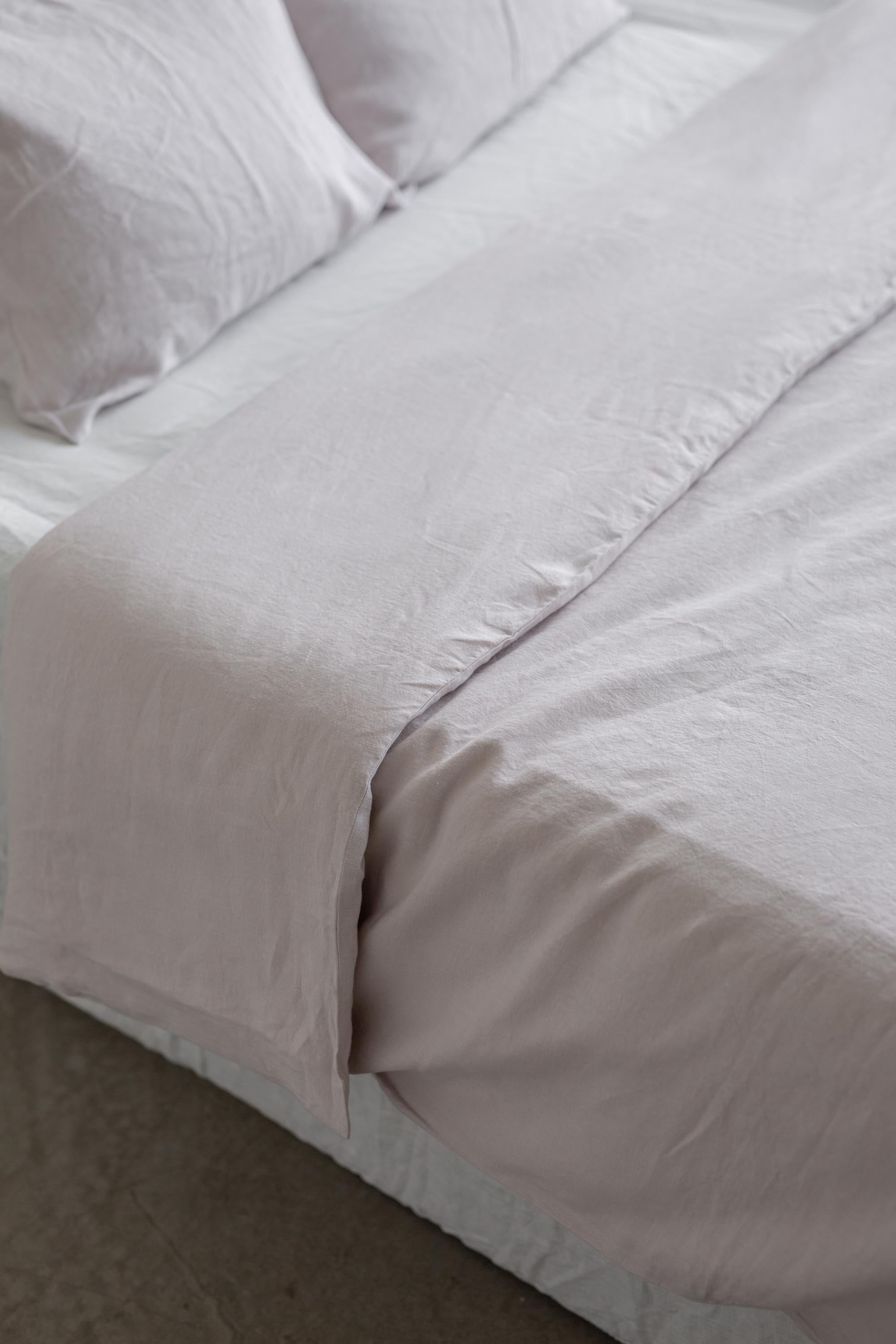 Close Up of Bed With Cream Linen Duvet Cover By AmourlInen