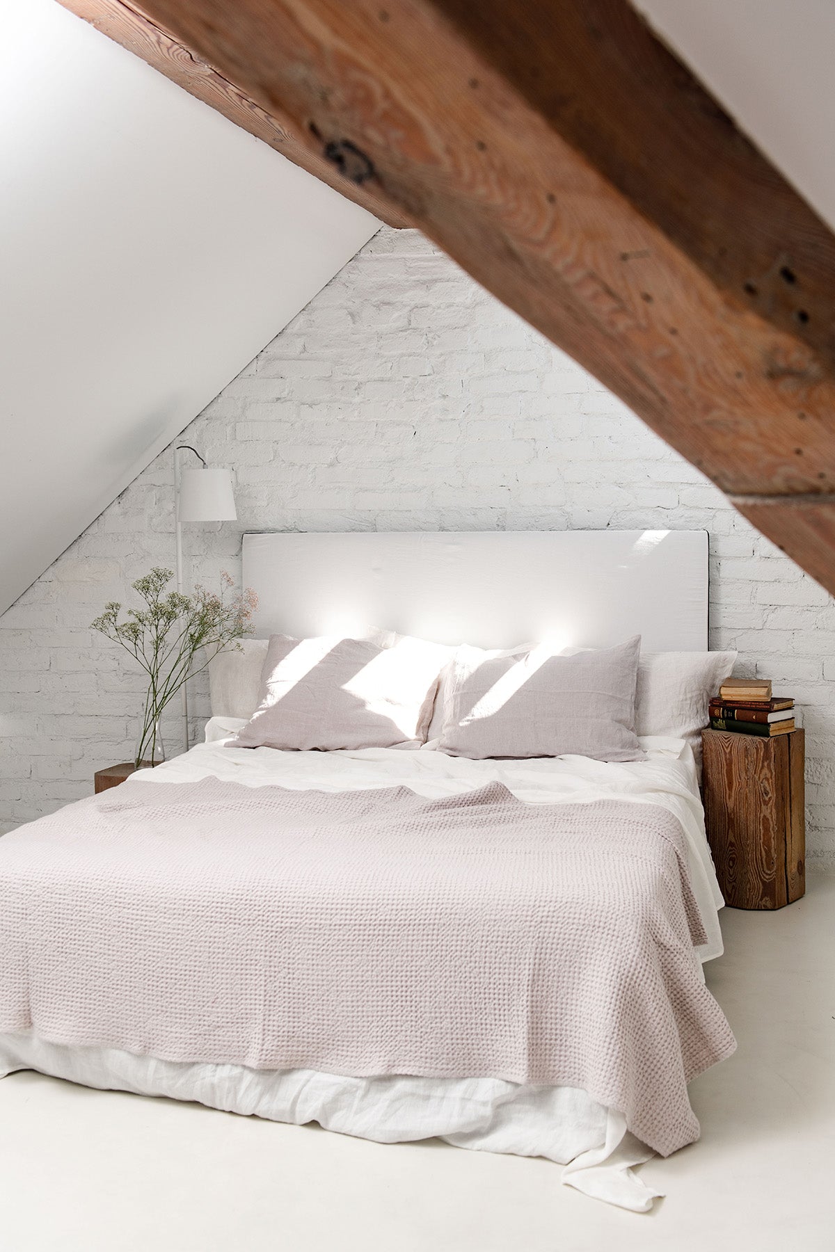 Rustic Room WIth White Bed and Cream Linen Bed Throw By AmourLinen
