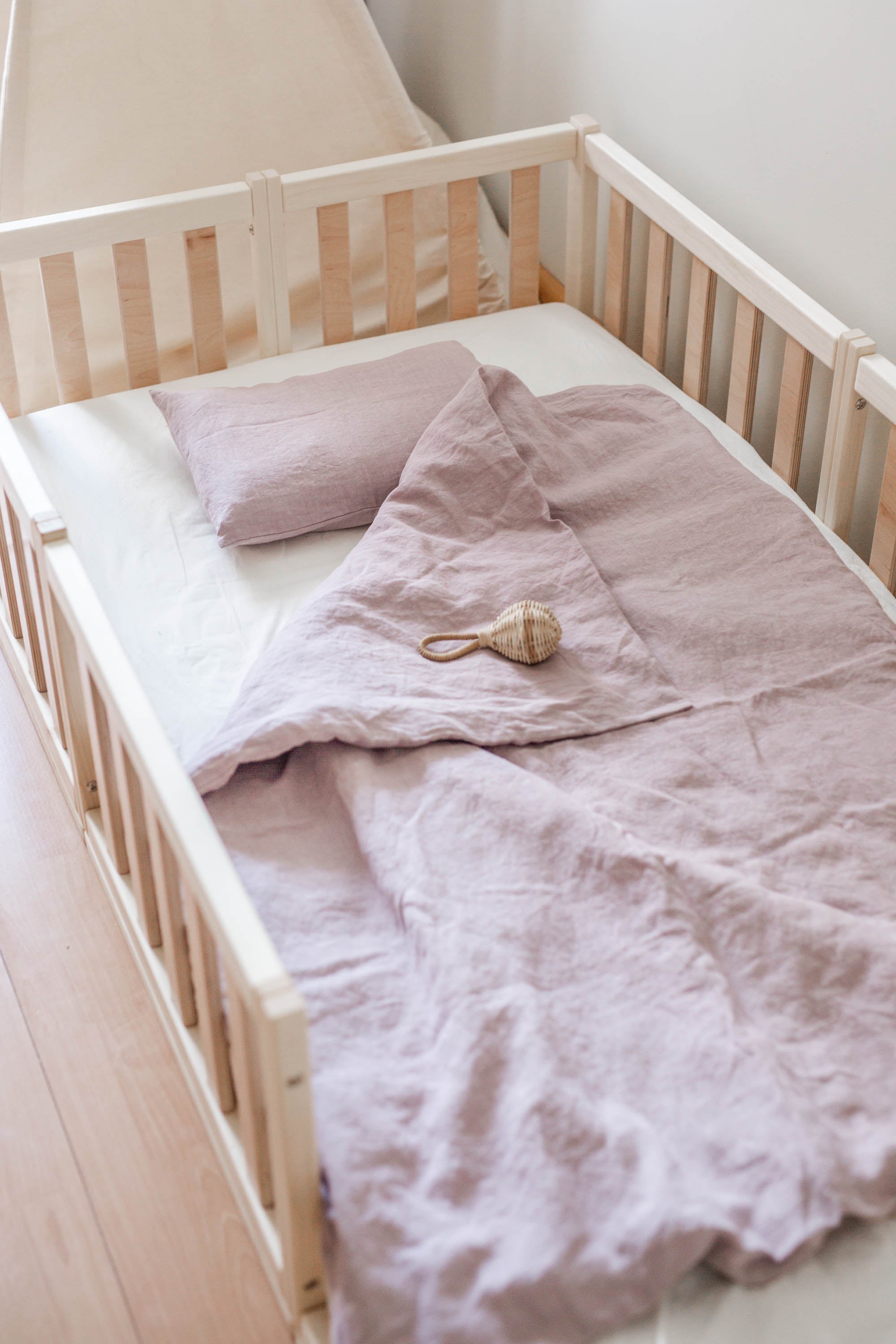 Linen baby bedding in Dusty Rose