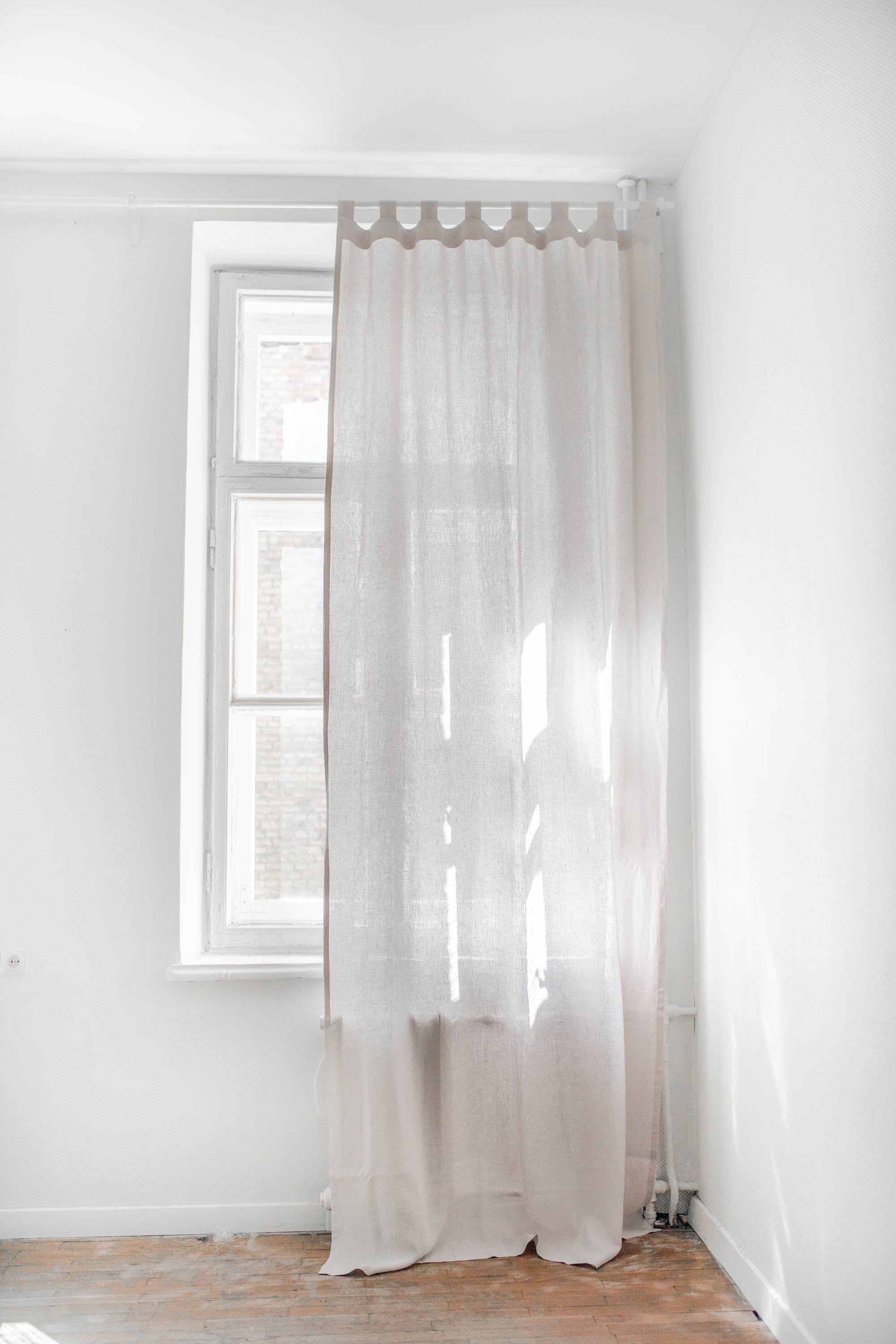 Tab top linen curtain in Cream