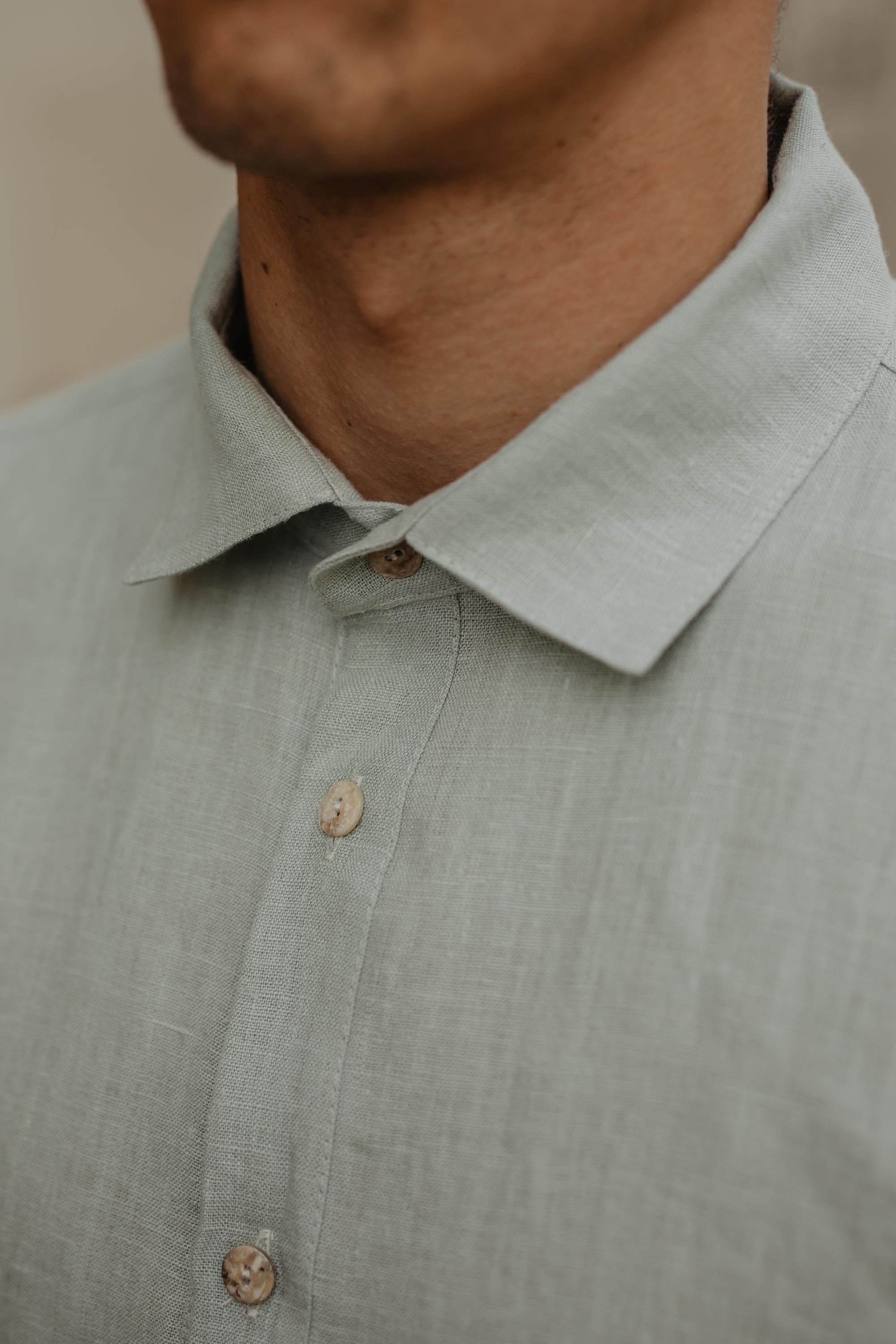 Close Up Of Sage Green Classic Linen Shirt Collar