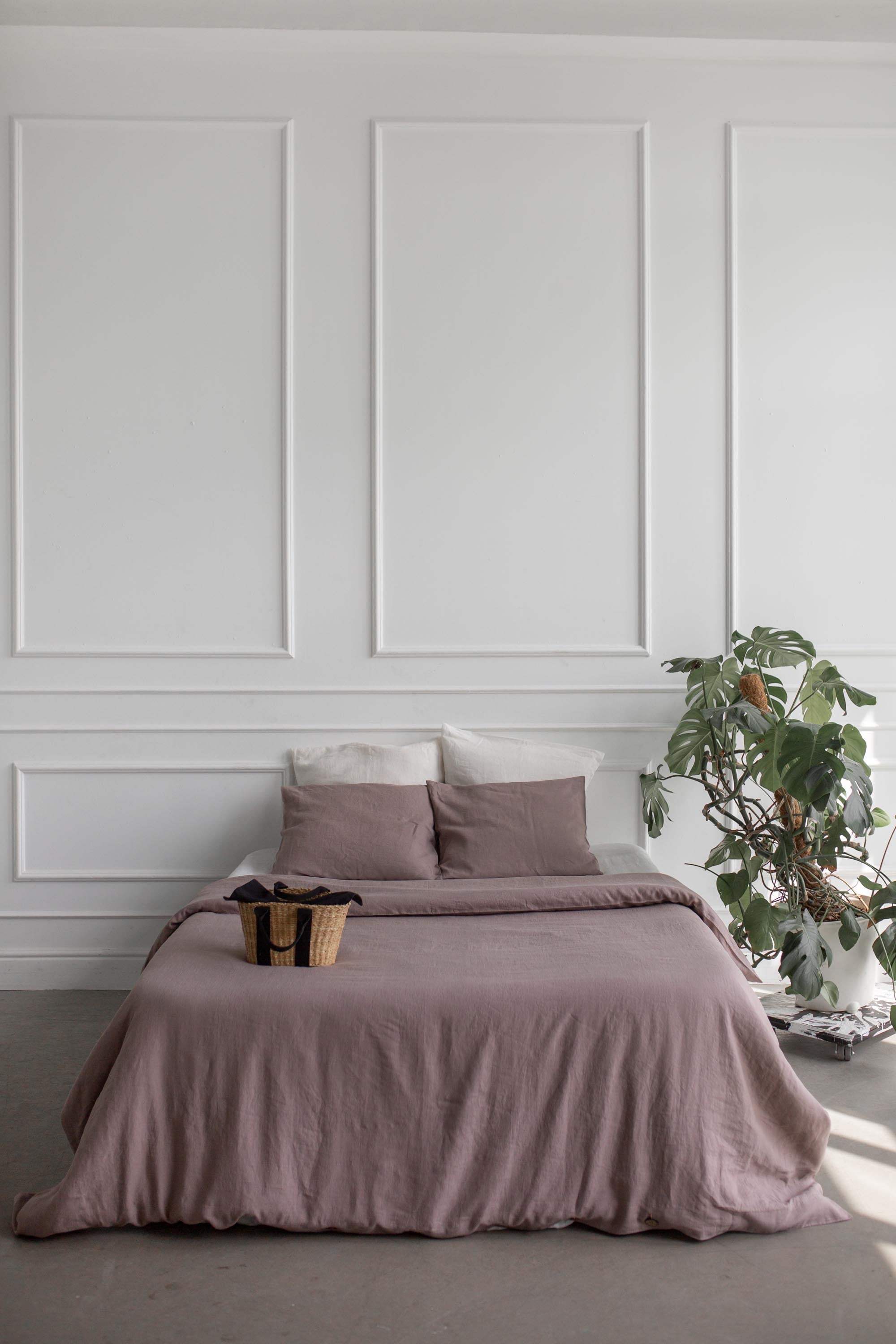 Bed in A white Room With A LInen Bedding Set In Rosy Brown BY AmourLinen