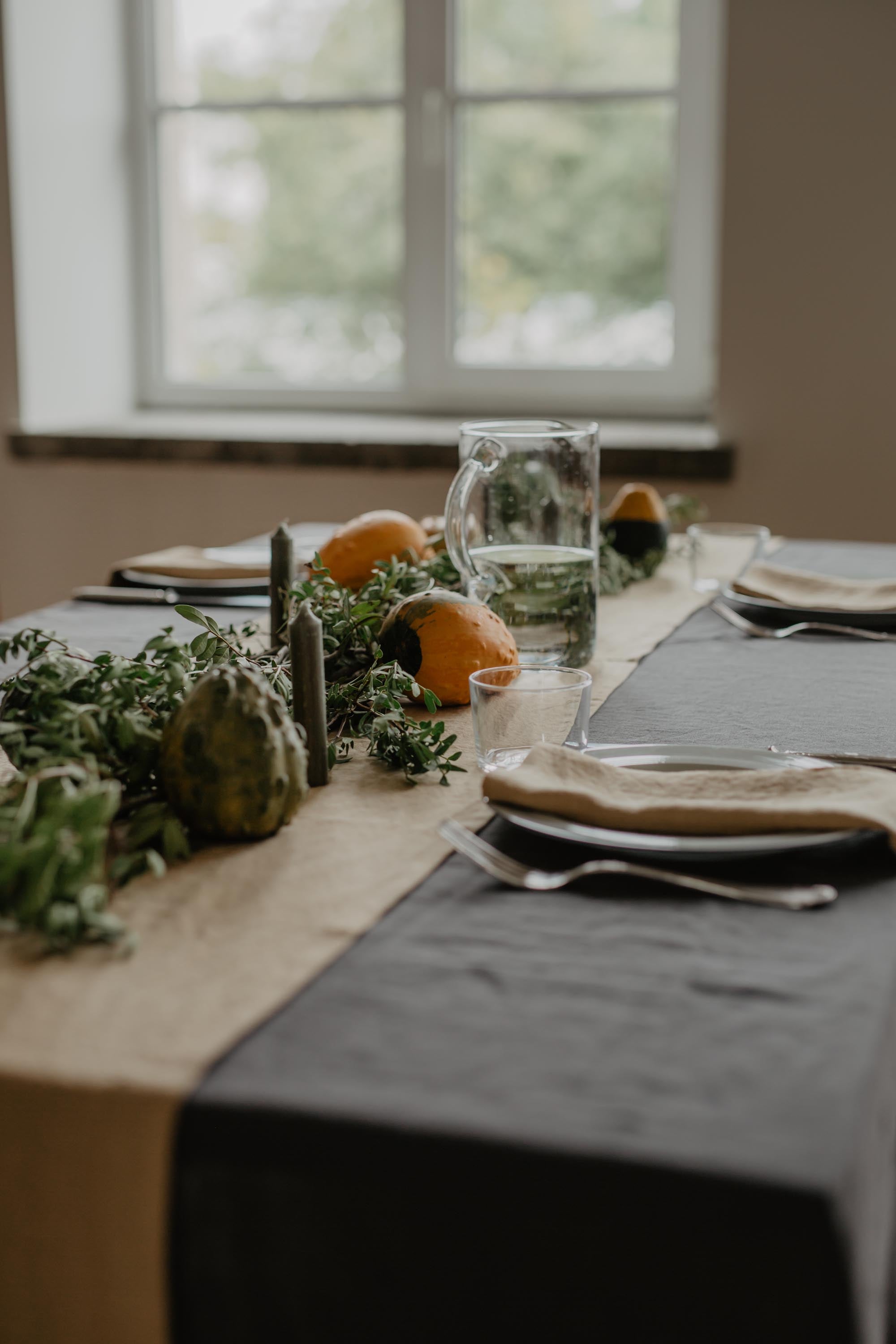 Side View Of Set Dinner Table With Charcoal Linen Tablecloth By Amourlinen