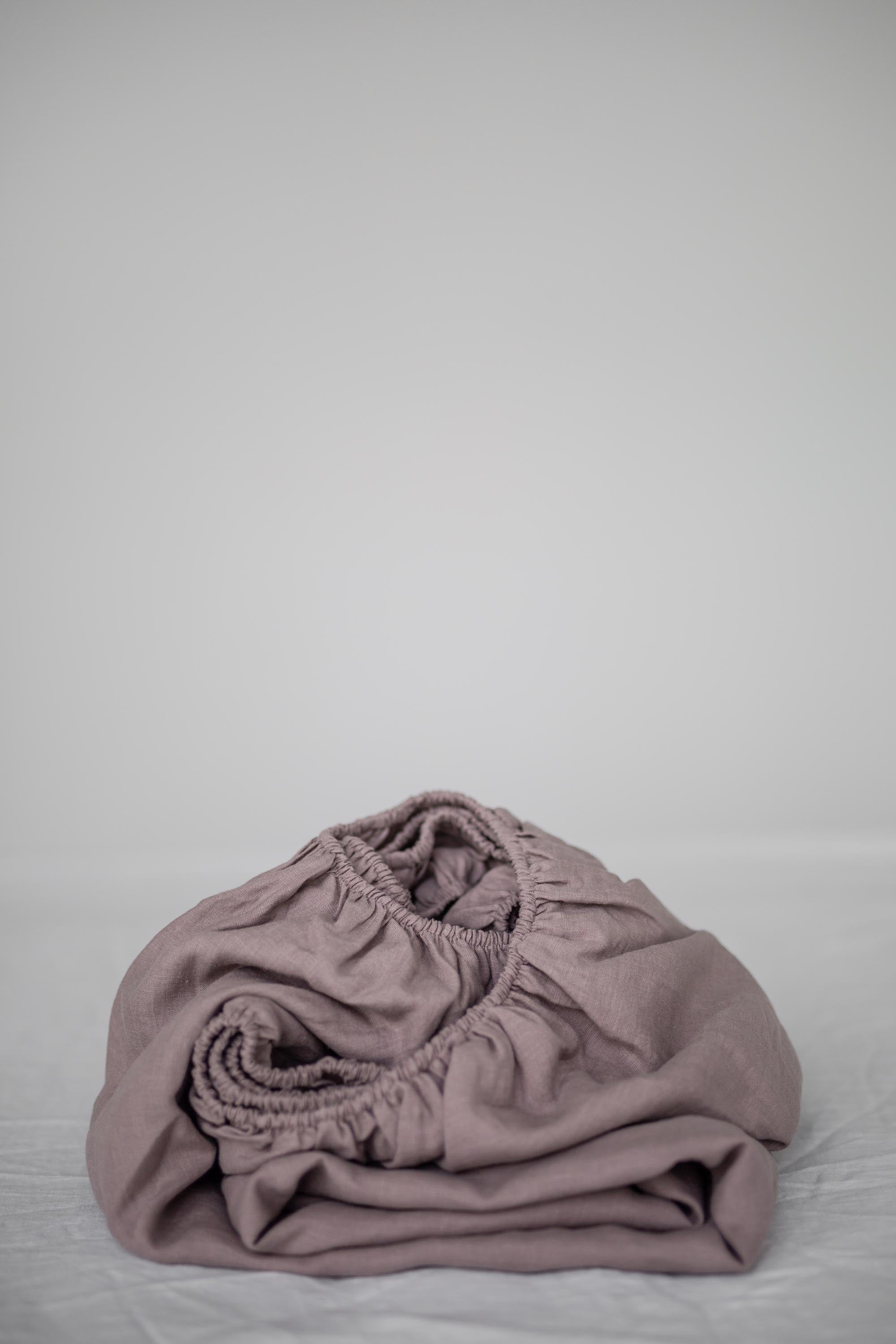 Close Up Of Linen Fitted Sheets In Rosy Brown By AmourlInen