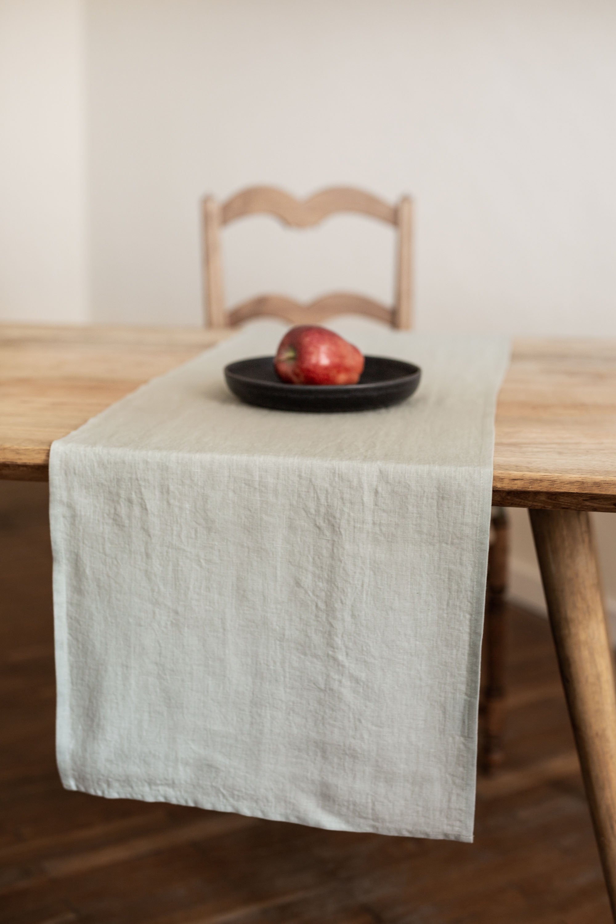 Close Up Of Dinner Table With Sage Green Linen Table Runner By AmourlInen