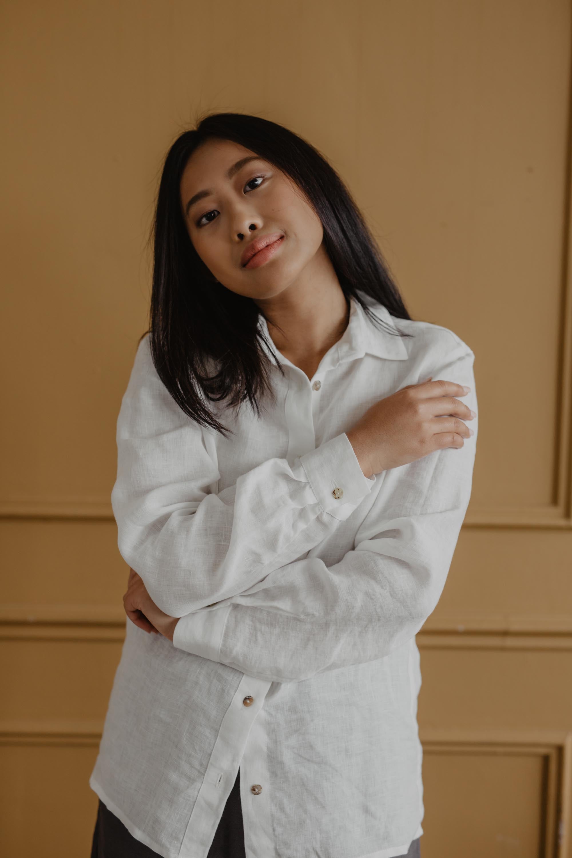 Close Up Of Woman Wearing A White Classic Linen Shirt By Amourlinen