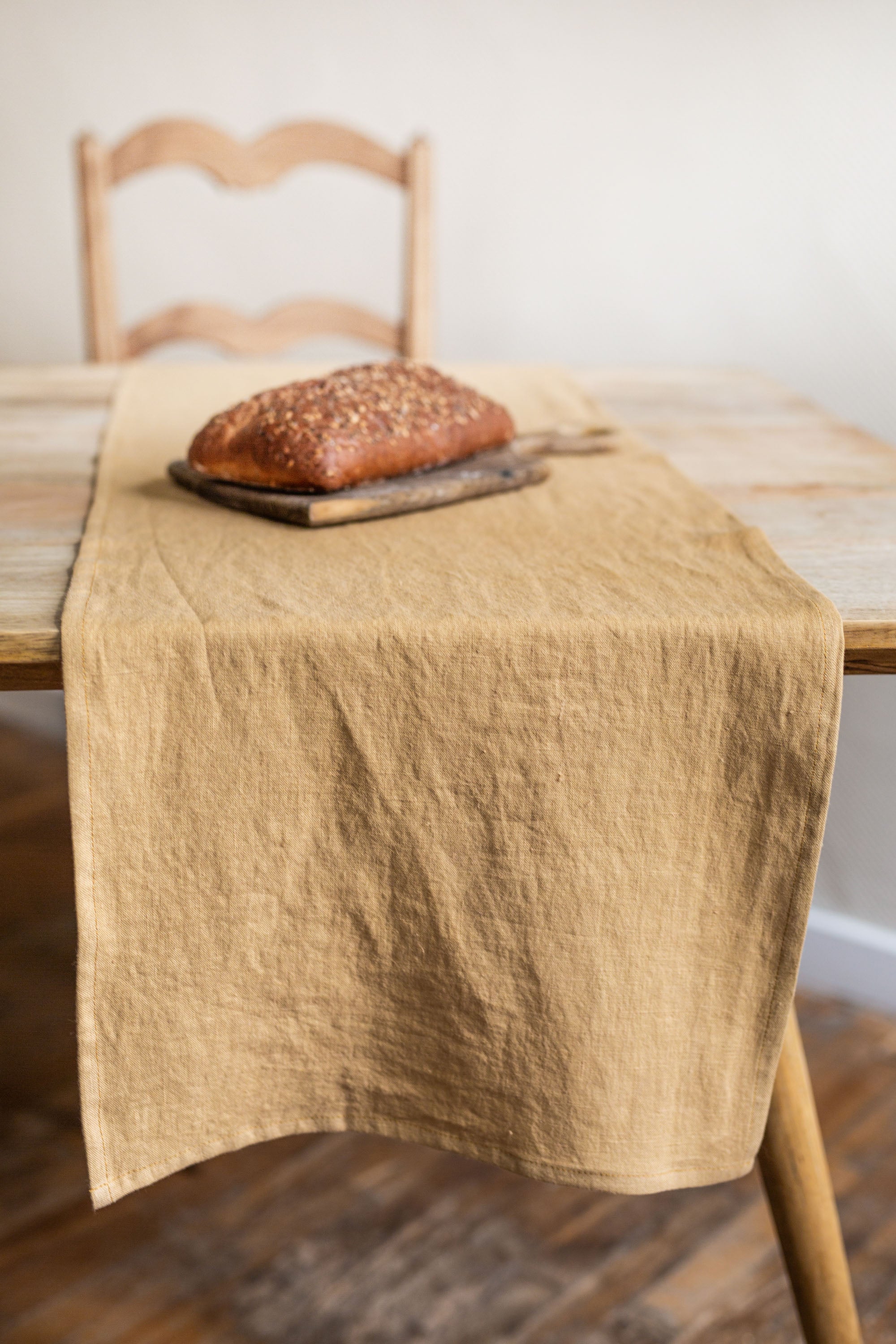 Close Up Of Rustic Dinner Table With Mustard Linen Table Runner By AmourlInen