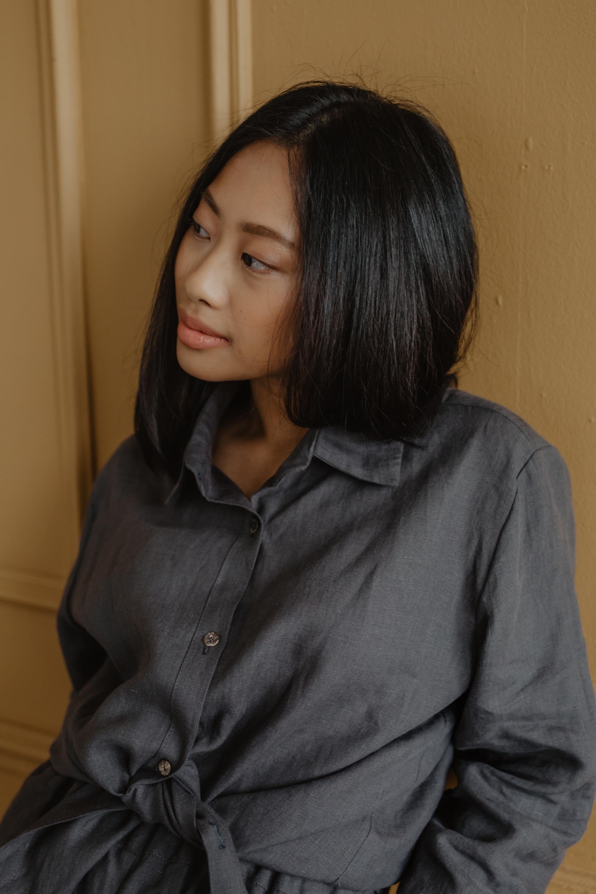 Close Up Of Woman Wearing A Charcoal Linen Casual Shirt By AmourLinen