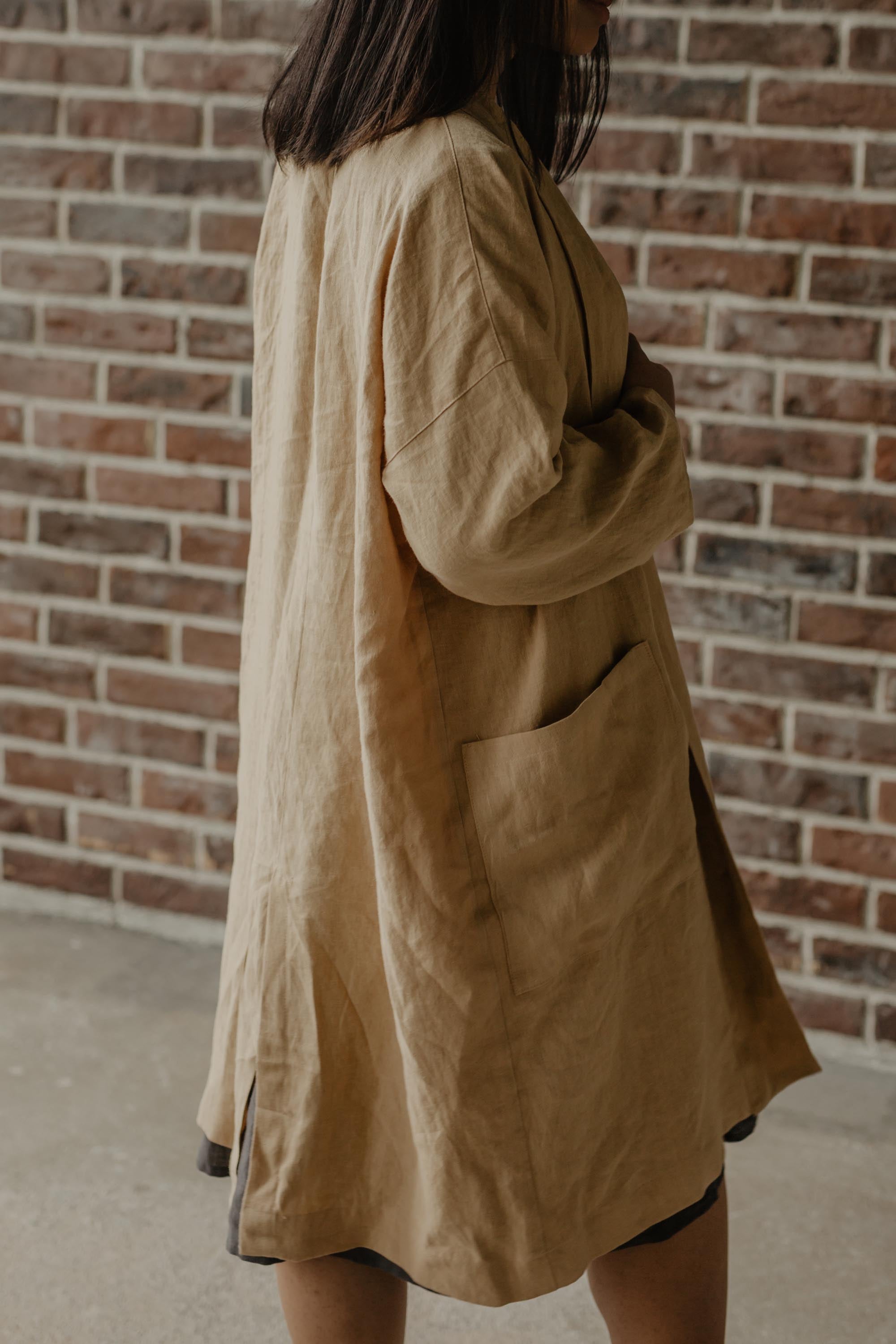 Close UP Of Side View For A Mid-Length Linen Coat