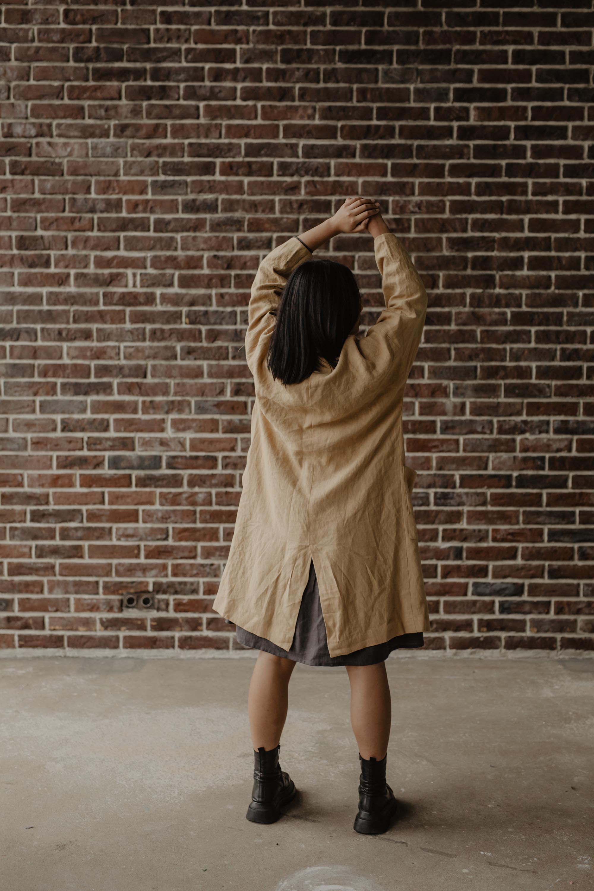 Woman Facing Back Wearing Mid-Length Linen Coat BY AmourLinen