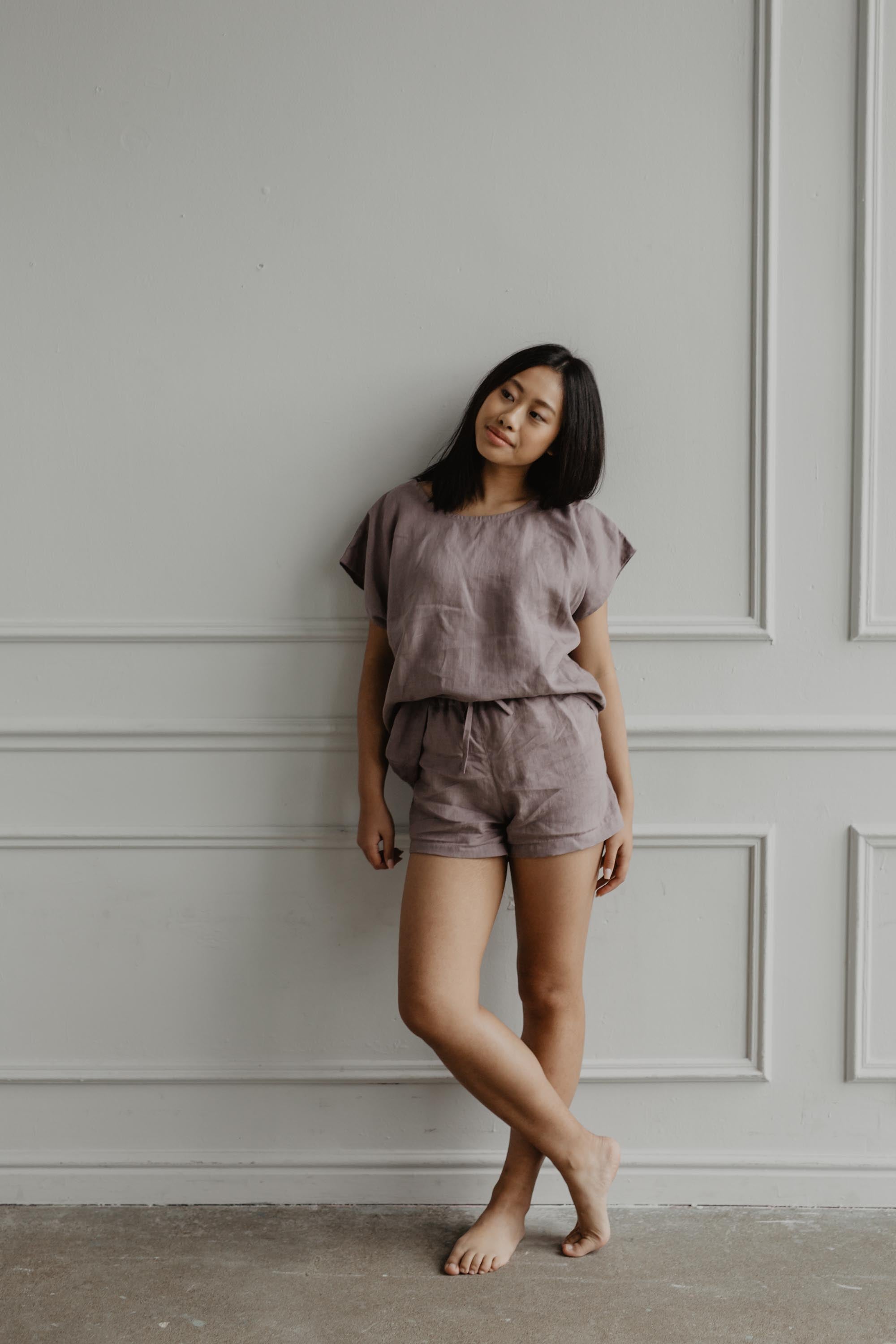 Woman Wearing A Rosy Brown Linen Short Sleeve Pajama Set By AmourLinen