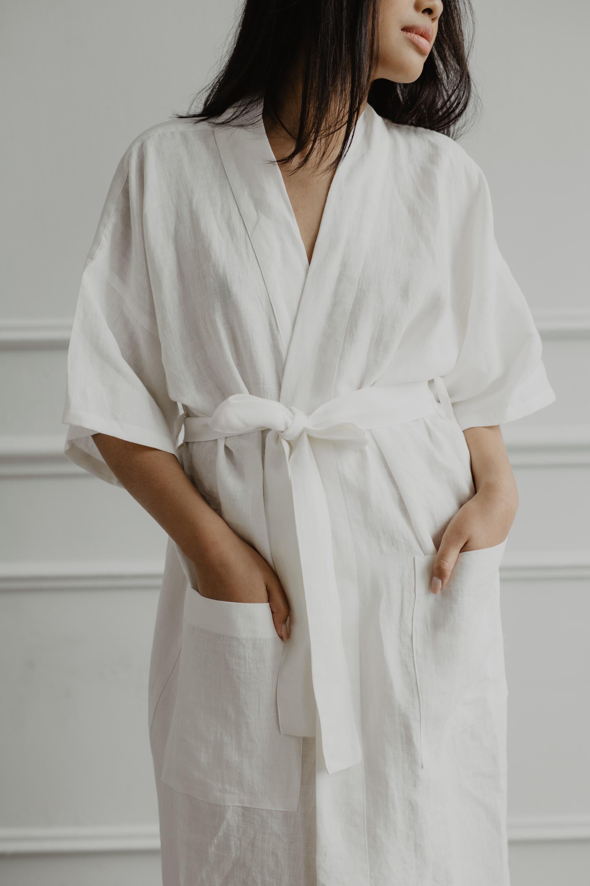Close Up Of Woman Wearing A White Linen Brahrobe By AmourLinen