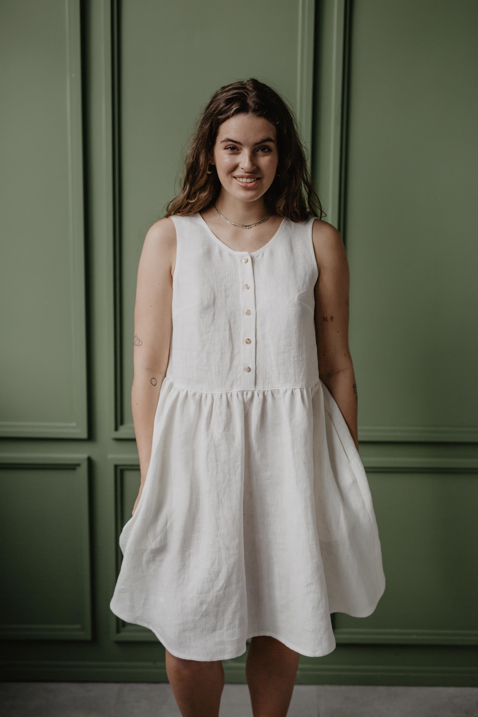 Front View Of Women Wearing White Linen Sleeverless Summer Dress by Amourlinen