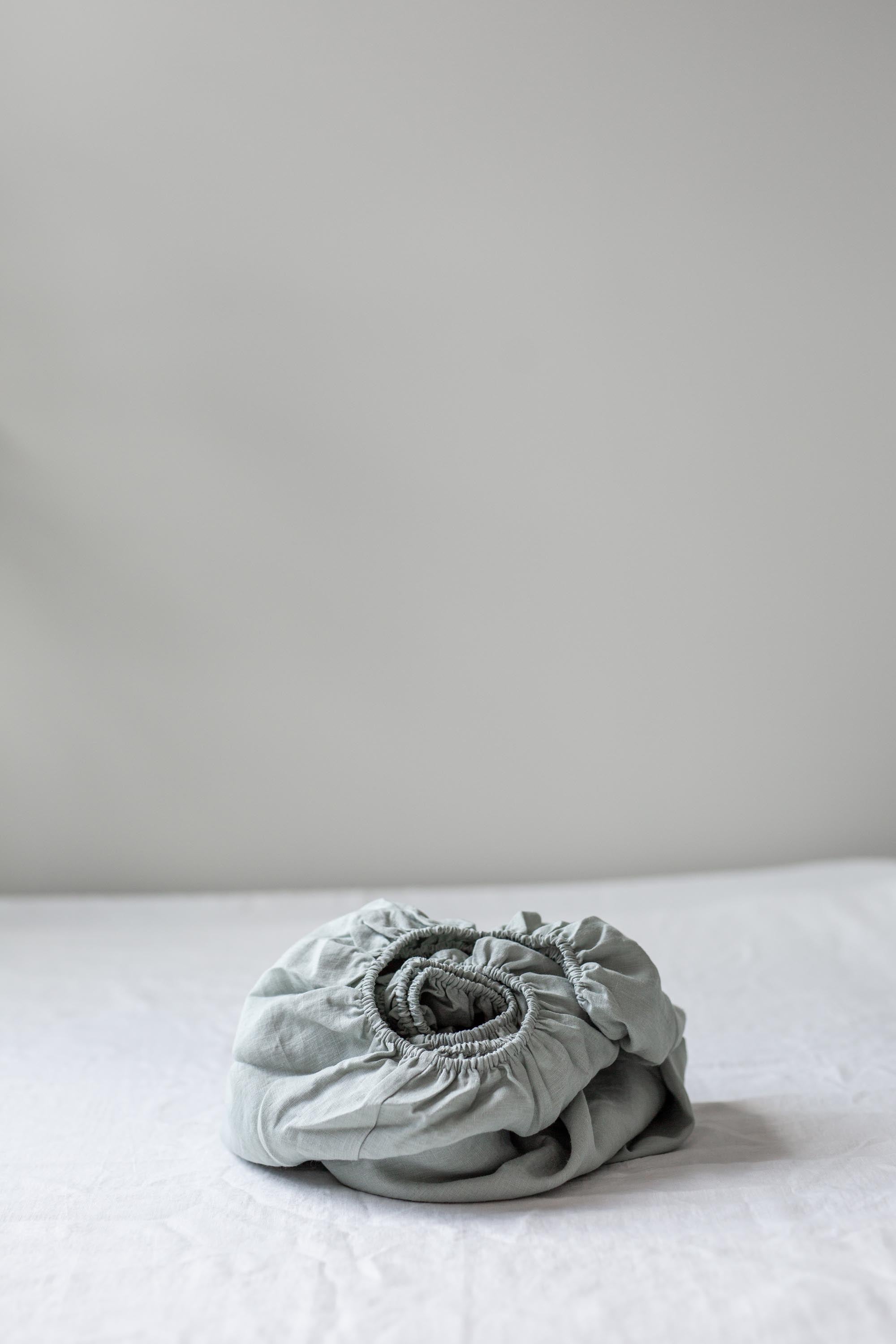 Close Up OF Sage Green Linen fitted sheet By AmourLinen