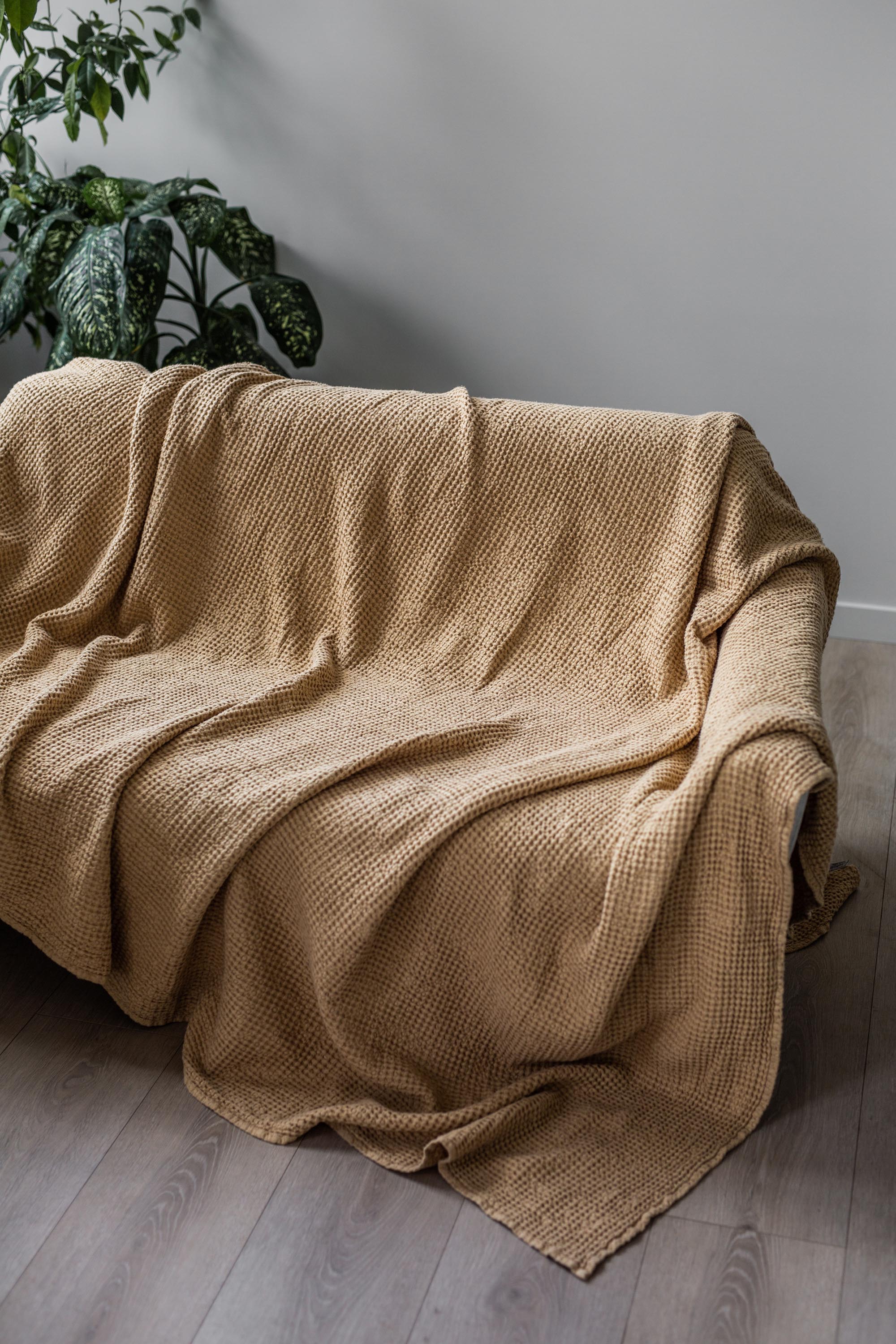 Side View Of Couch with Linen Waffle Blanket In Mustard By AmourLinen