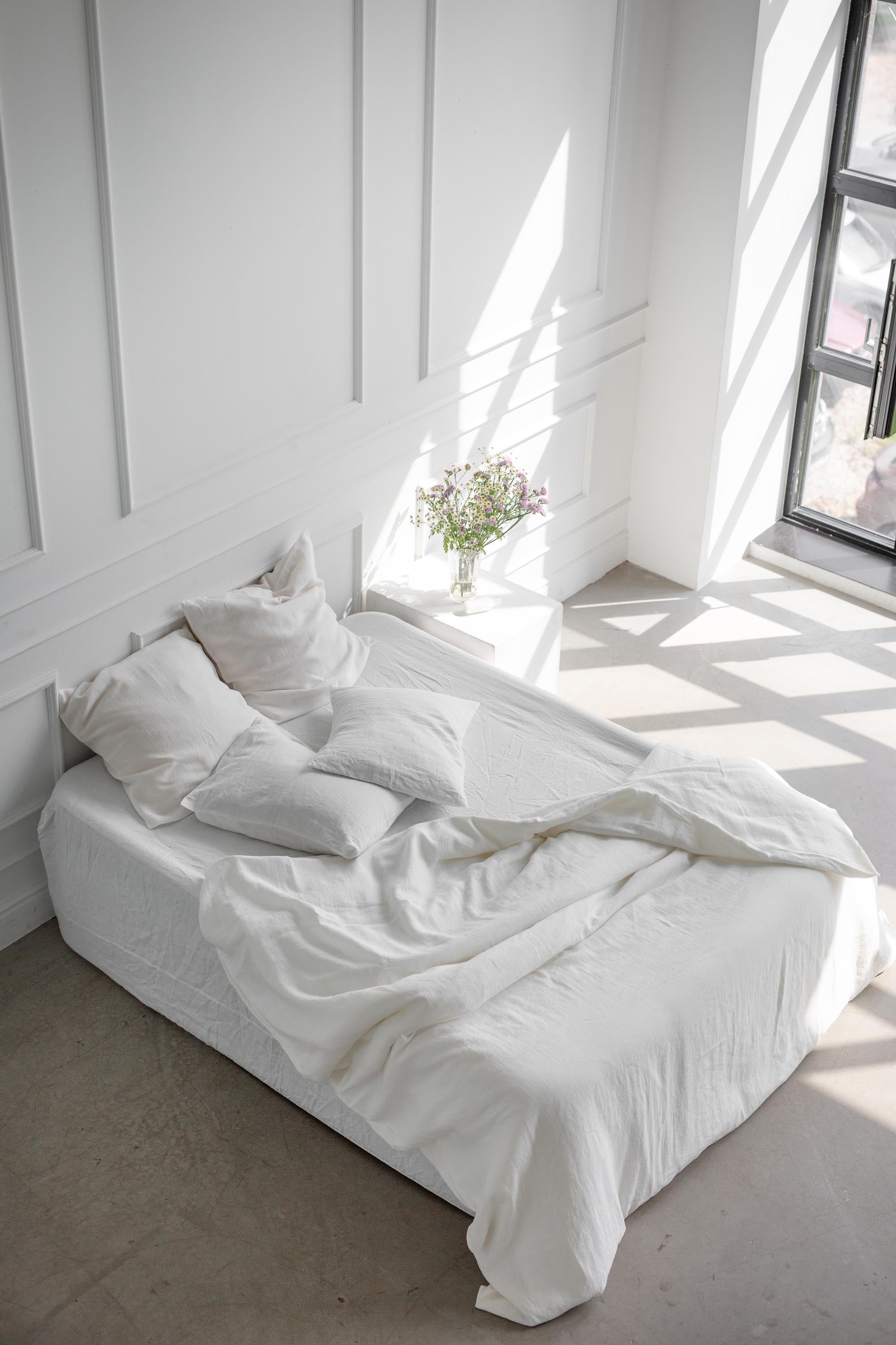 Top View of undone Bed With White Linen Duvet Cover By AmourlInen