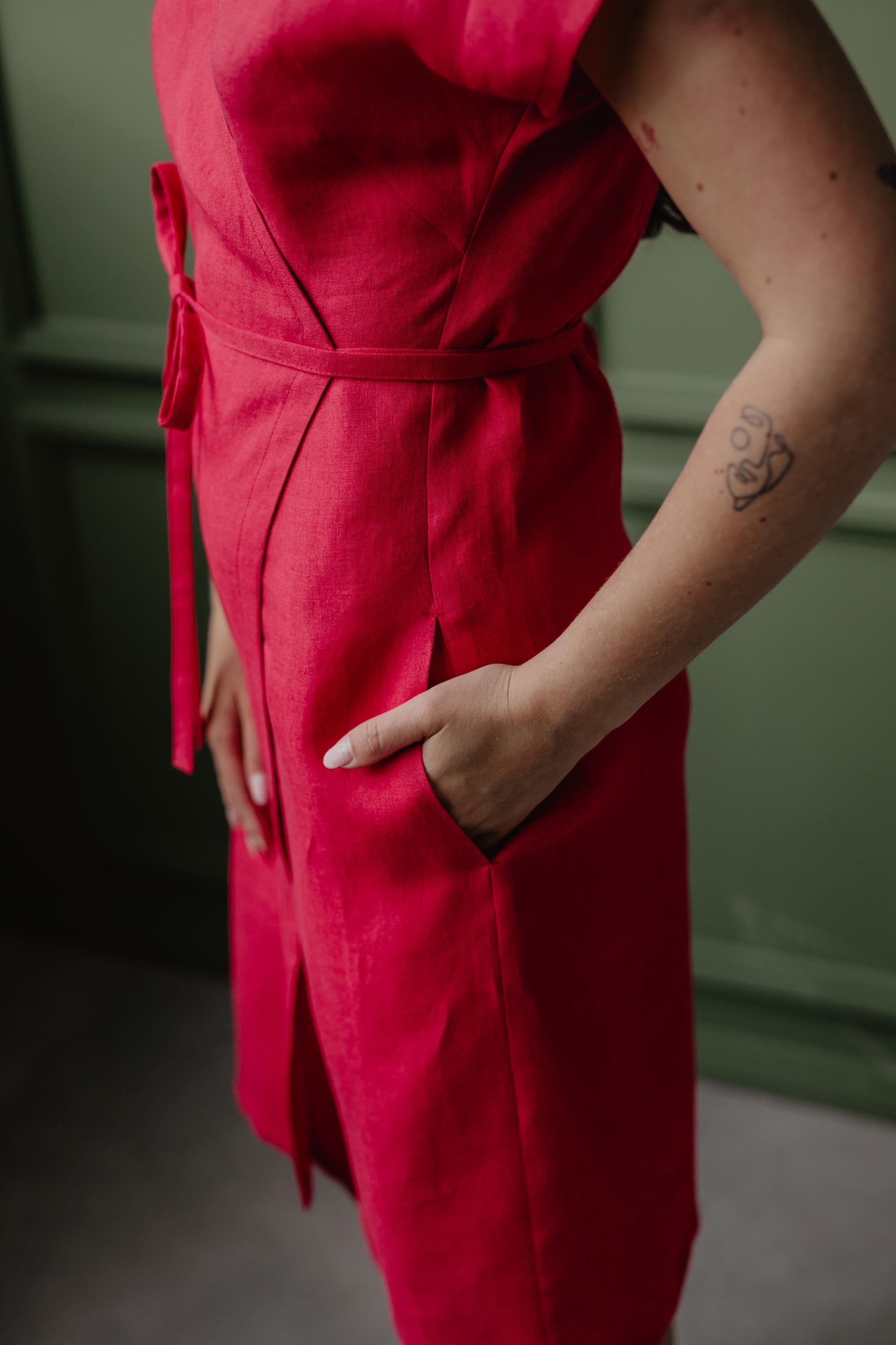 Close Up On The Side Of Red Linen Wrap Dress