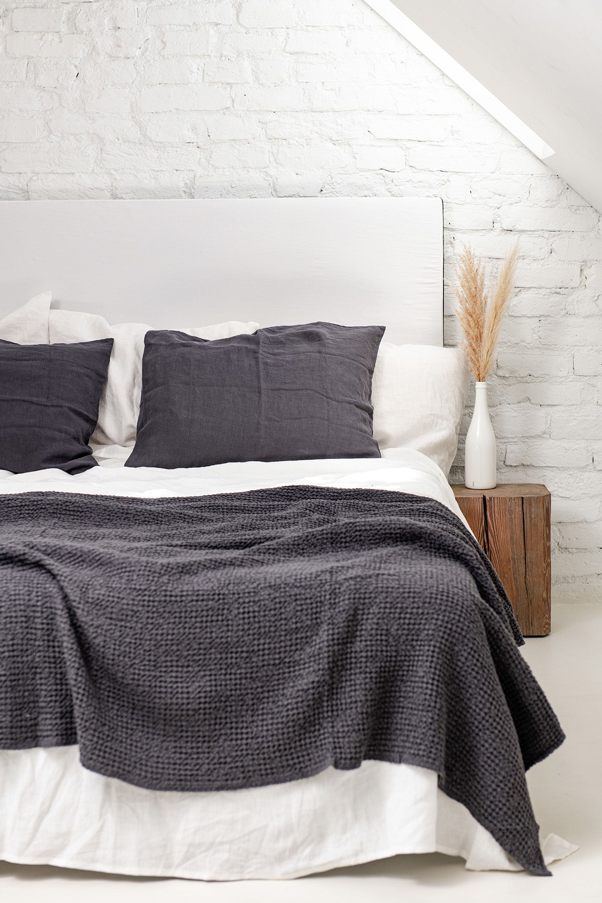 Bed With Linen Waffle Bed Throw in Charcoal On Top By AmourLinen