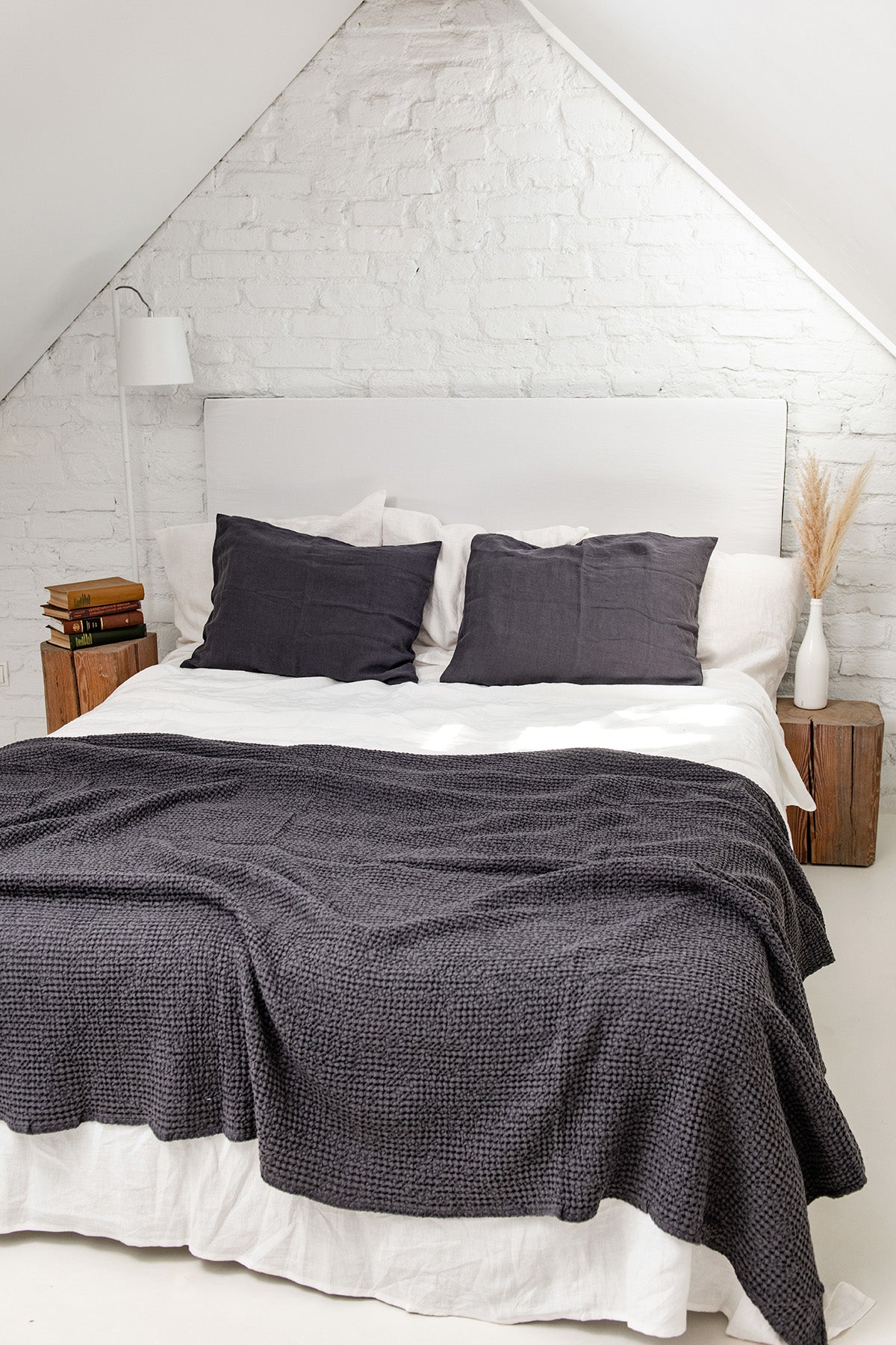 Bed With Linen Waffle Bed Throw in Charcoal On Top And Charcoal Pillowcases By AmourLinen
