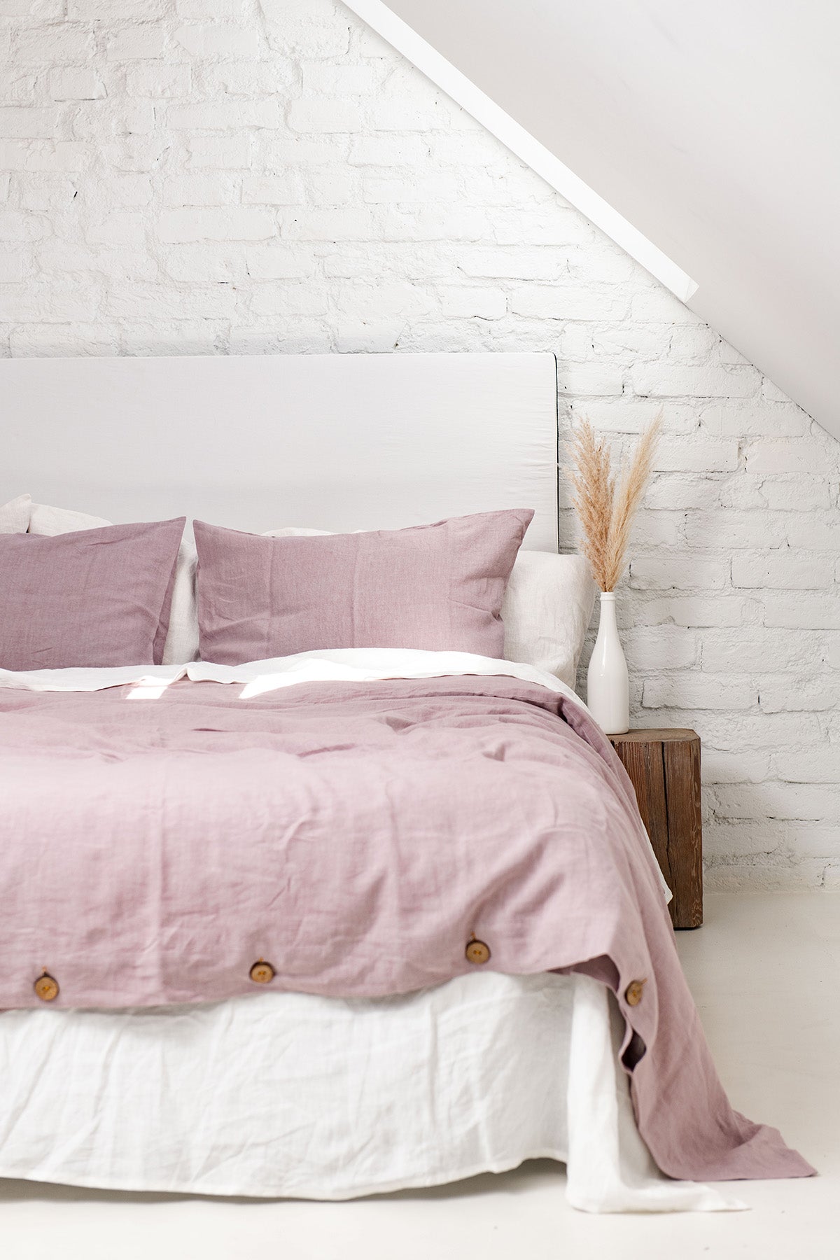 Corner of Bed With Dusty Rose Linen Duvet Cover By AmourlInen