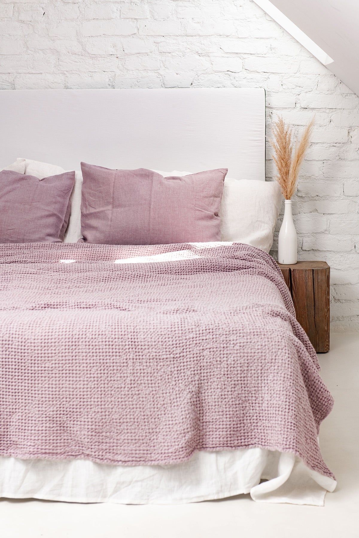 Close Up Of Dusty Rose Linen Waffle Blanket On Bed By AmourLinen