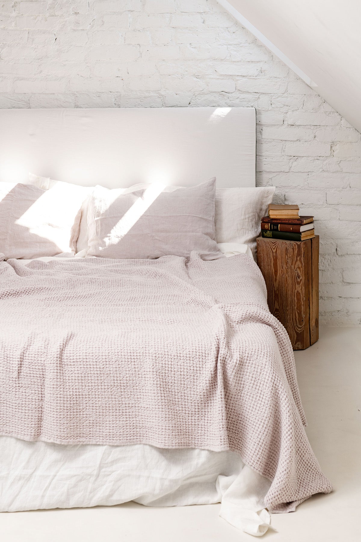 Cream Linen Waffle Blanket on Corner of Bed by Amourlinen