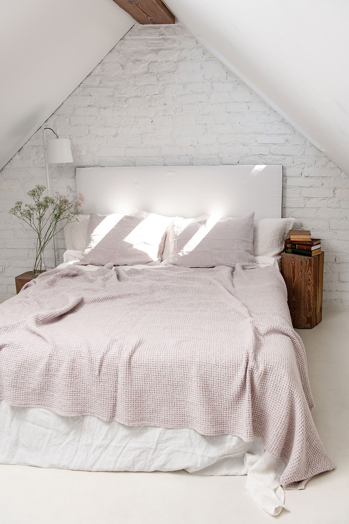 Cream Linen Waffle Blanket on Bed of A white Rustic Room by Amourlinen