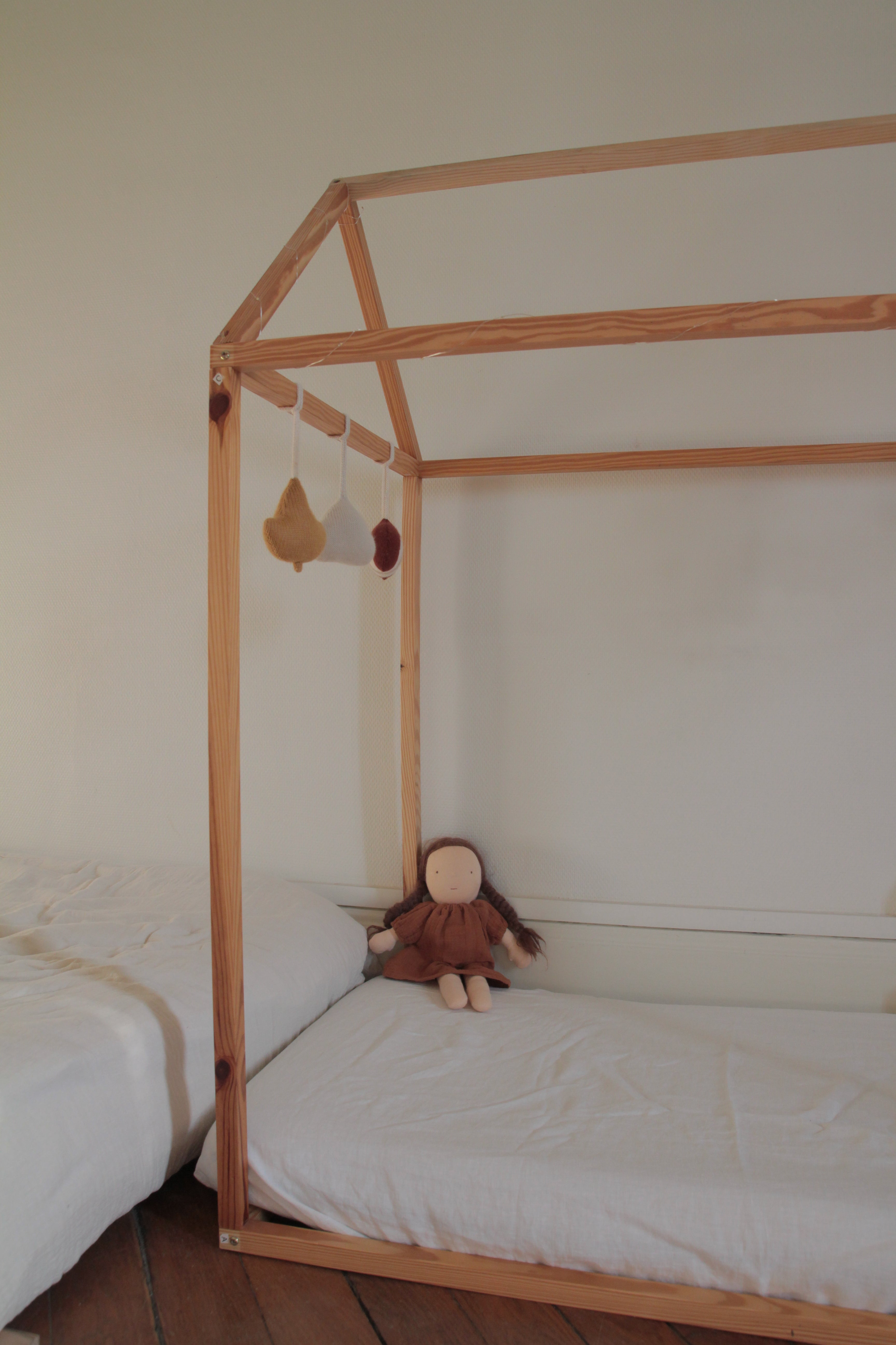 Bed Framed and With White Linen Crib Sheet By Amourlinen
