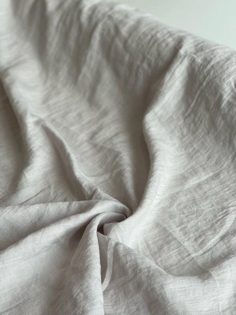 Close Up Of White Linen Fabric By AmourlInen
